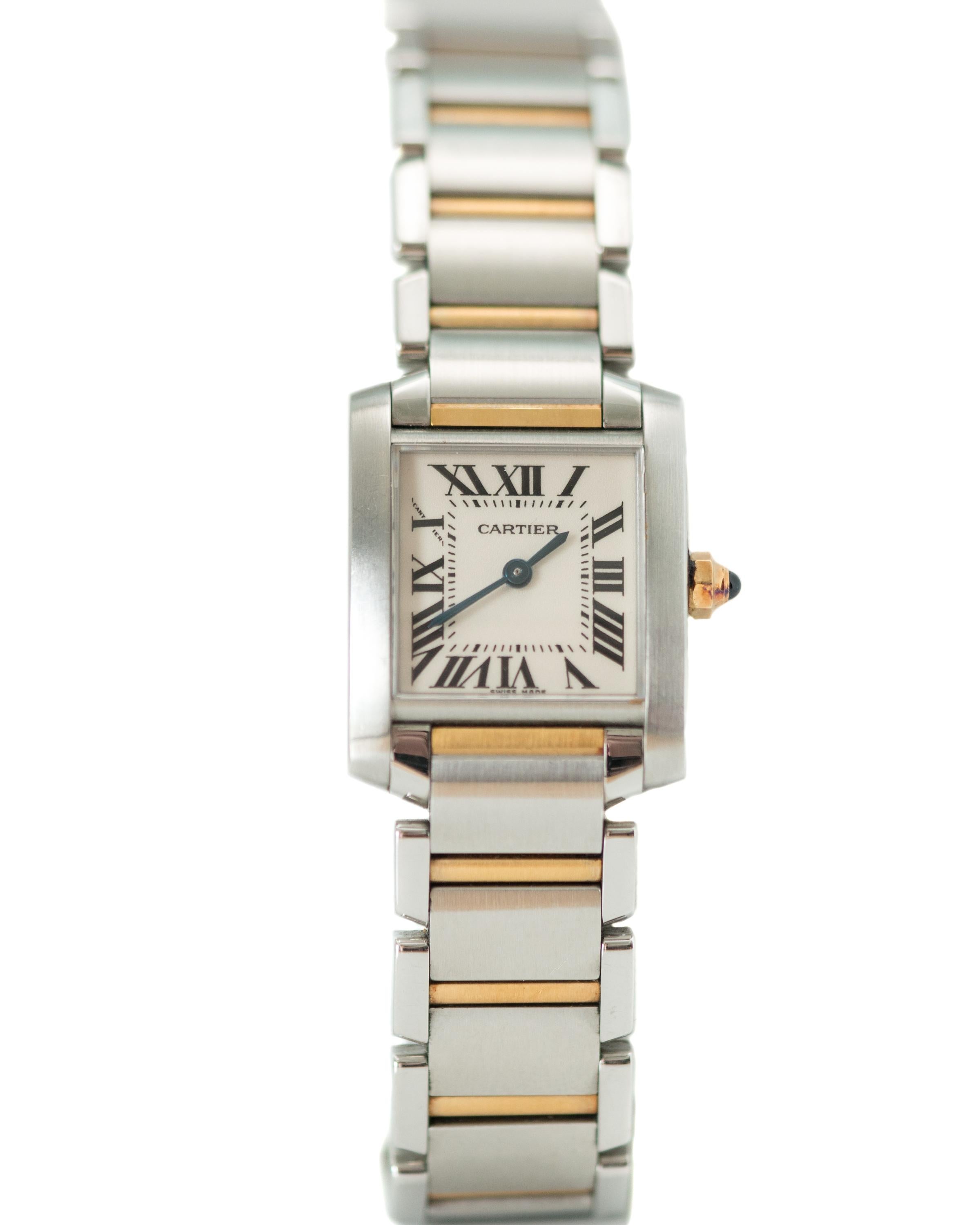 1998 Ladies Cartier Tank Française Wrist Watch - 18 Karat Yellow Gold, Stainless Steel

Features:
Model Reference: 2384
Comes with Red Suede Travel Pouch & Cartier Certificate
18 Karat Yellow Gold and Stainless Steel
Case measures 26 x 20