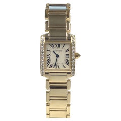 Cartier, montre-bracelet Tank Francaise pour femme en or et quartz avec diamants