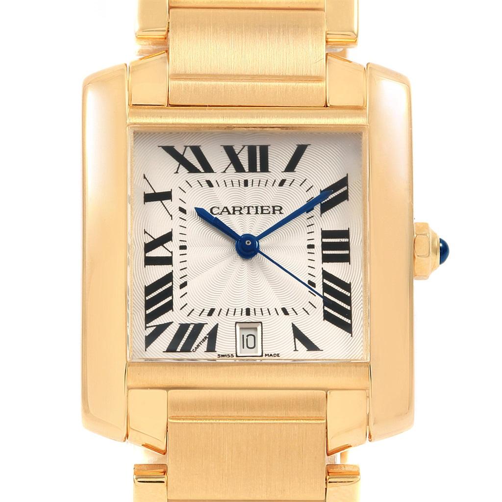 Cartier Tank Francaise Large 18K Yellow Gold Automatic Watch W50001R2. Automatic self-winding movement. Rectangular 28.0 x 32.0 mm case. Octagonal 18K yellow gold crown set with a blue sapphire cabochon. Scratch resistant sapphire crystal. Silver