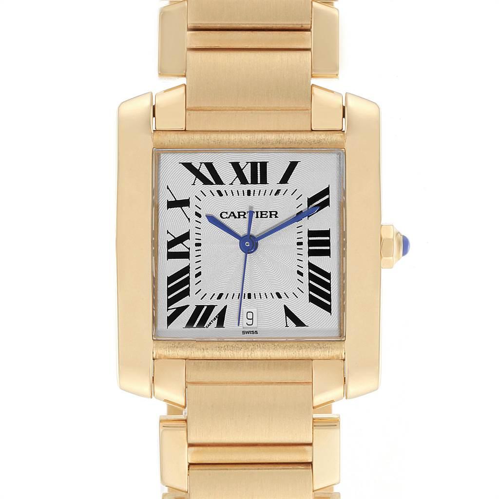 Cartier Tank Francaise Large 18K Yellow Gold Ladies Watch W50001R2. Automatic self-winding movement. Rectangular 28.0 x 32.0 mm case. Octagonal 18K yellow gold crown set with a blue sapphire cabochon. Scratch resistant sapphire crystal. Silver