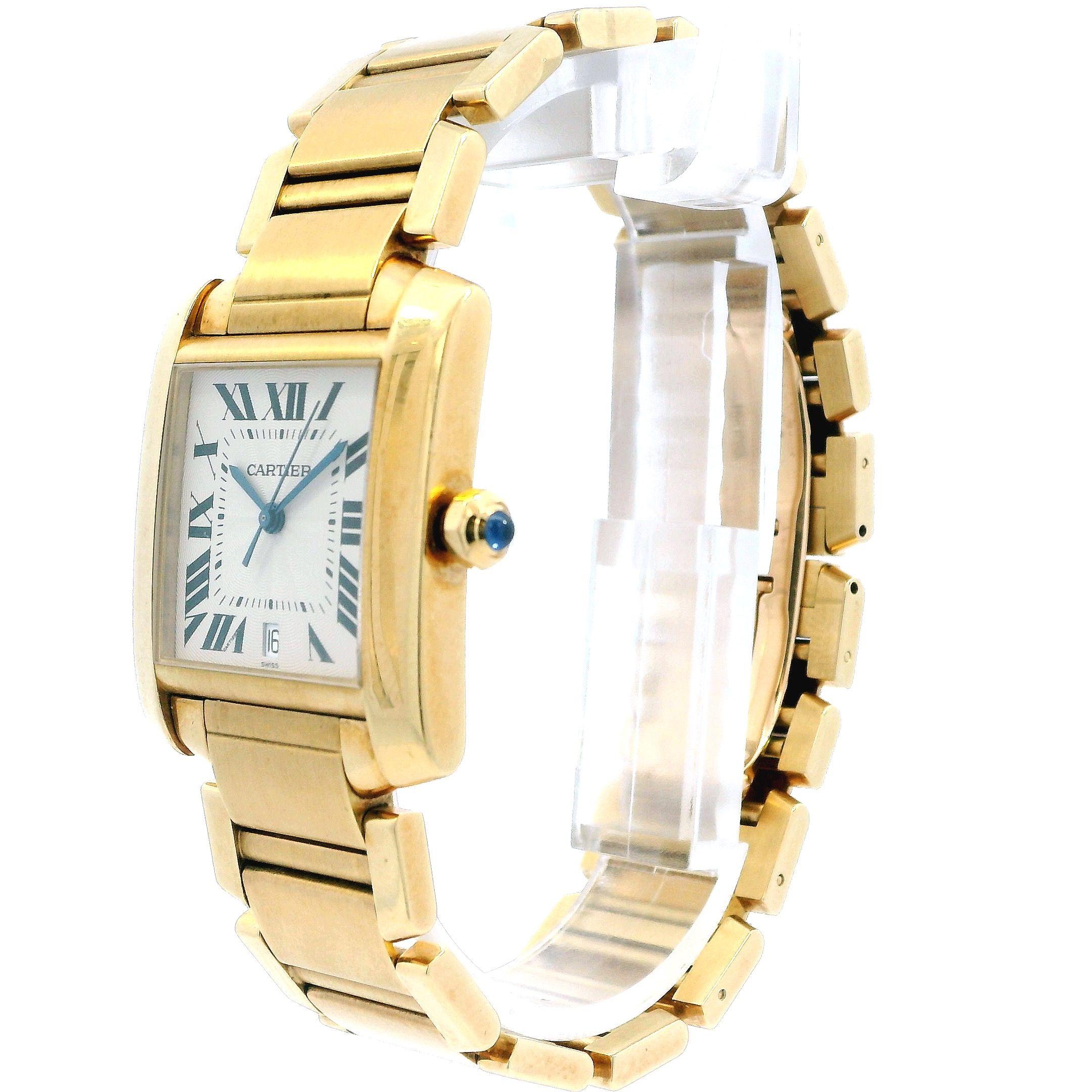 Cartier Tank Francaise W50001R2 / 1840 Mens Watch. 28mm 18K yellow gold case. Ivory dial with blue steel hands and black Roman numeral hour markers. Date display at the 6 o'clock position. Minute markers on the inner dial. 18K yellow gold bracelet