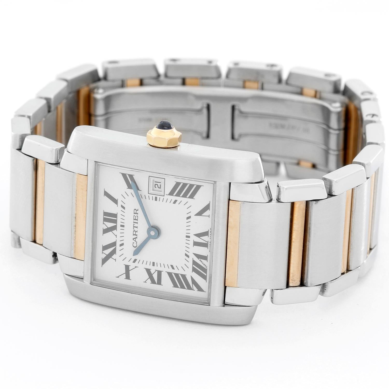 Cartier Tank Francaise Men's 2-Tone Watch W51005Q4 - Quartz. Stainless steel case. Silver guilloche dial with black Roman numerals; date at 3 o'clock. Stainless steel and 18k yellow gold Cartier bracelet with deployant buckle. Pre-owned with Cartier