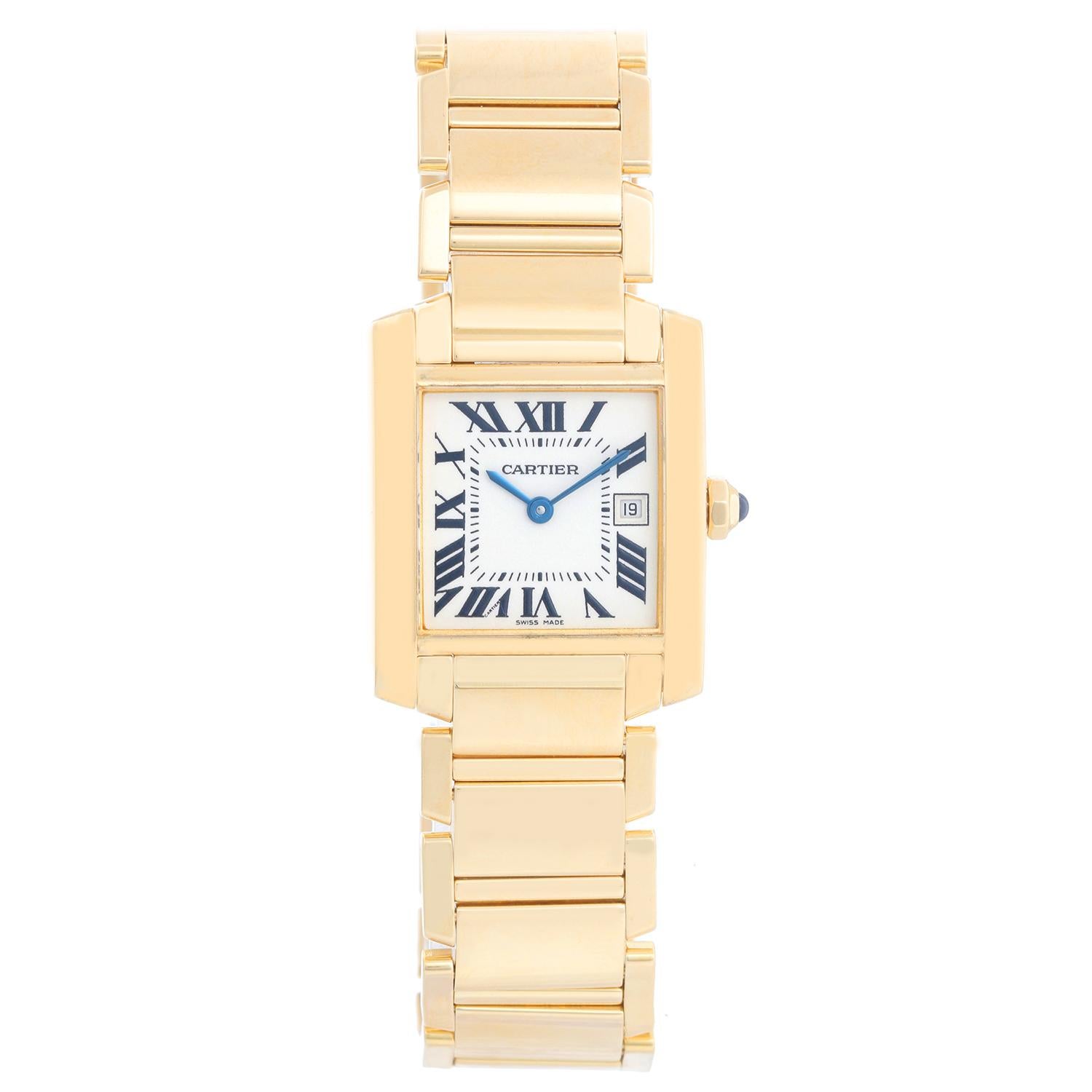 Cartier Tank Francaise Midsize 18k Yellow Gold Watch W50014N2 2466 - Quartz. 18k yellow gold  case; blue sapphire cabochon crown (25mm x 30mm).  Ivory colored dial with black Roman numerals; date at 3 o'clock. Cartier 18k yellow gold bracelet; will