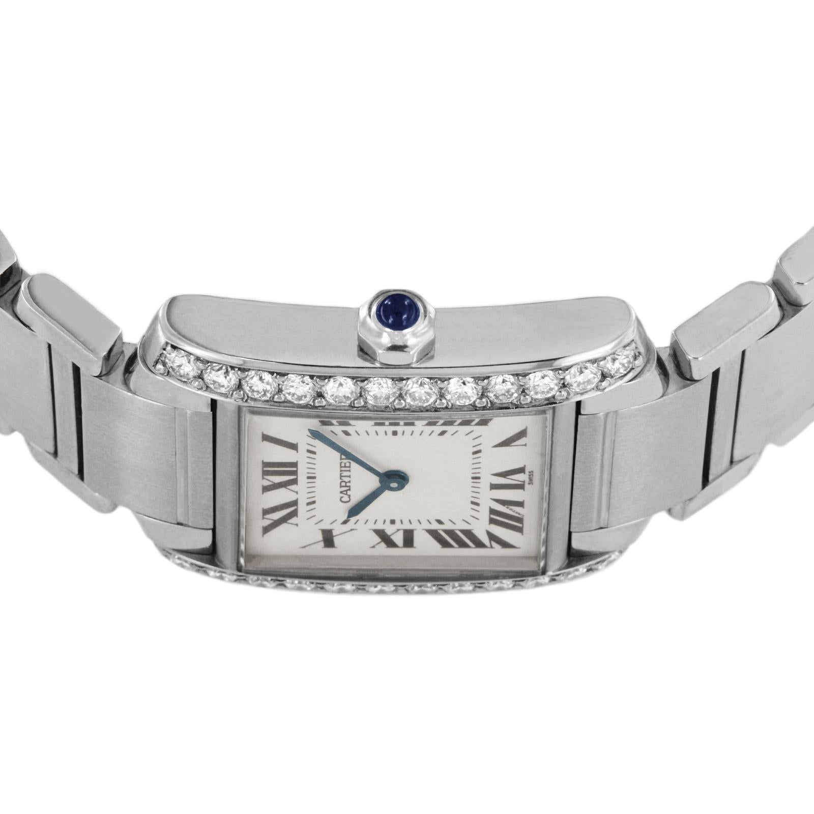 CARTIER TANK FRANCAISE MIDSIZE CUSTOM DIAMOND BEZEL 1.1CT. WATCH 2301

-Mint condition
-Case size: 25x29mm
-Case thickness: 6.6mm
-Stainless steel
-Movement: Quartz
-White dial with painted black radial roman numerals
-Lug width: 17.7mm
-Deployment