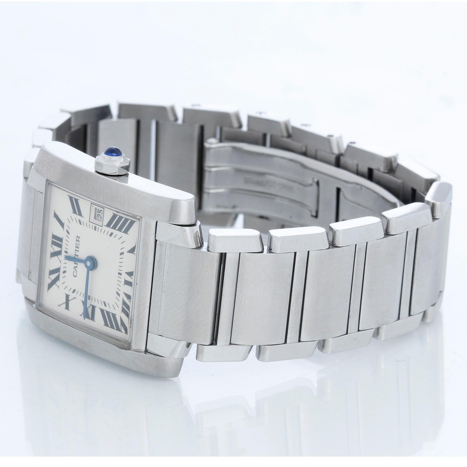 Cartier Tank Francaise Midsize Stainless Steel Watch W51011Q3 2465 - Quartz. Stainless steel case (25mm x 30mm). Ivory colored dial with black Roman numerals; date at 3 o'clock. Stainless steel bracelet with deployant clasp. Pre-owned with Cartier