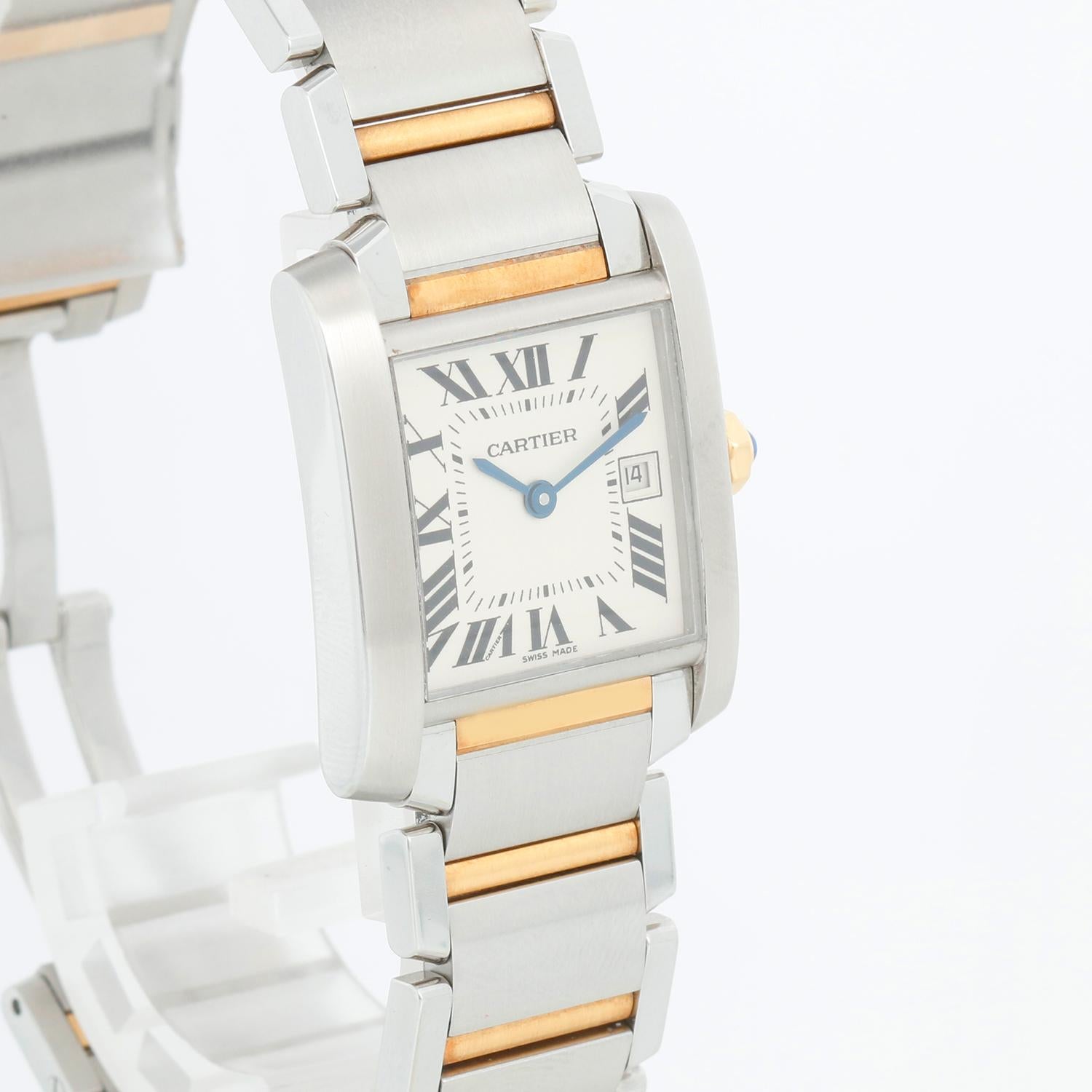 Cartier Tank Francaise Midsize Stainless Steel & Yellow Gold  Watch 2465 W51012Q4 - Quartz. Stainless steel & yellow gold  case (25mm x 30mm). Ivory colored dial with black Roman numerals; date at 3 o'clock. Stainless steel and yellow gold Cartier