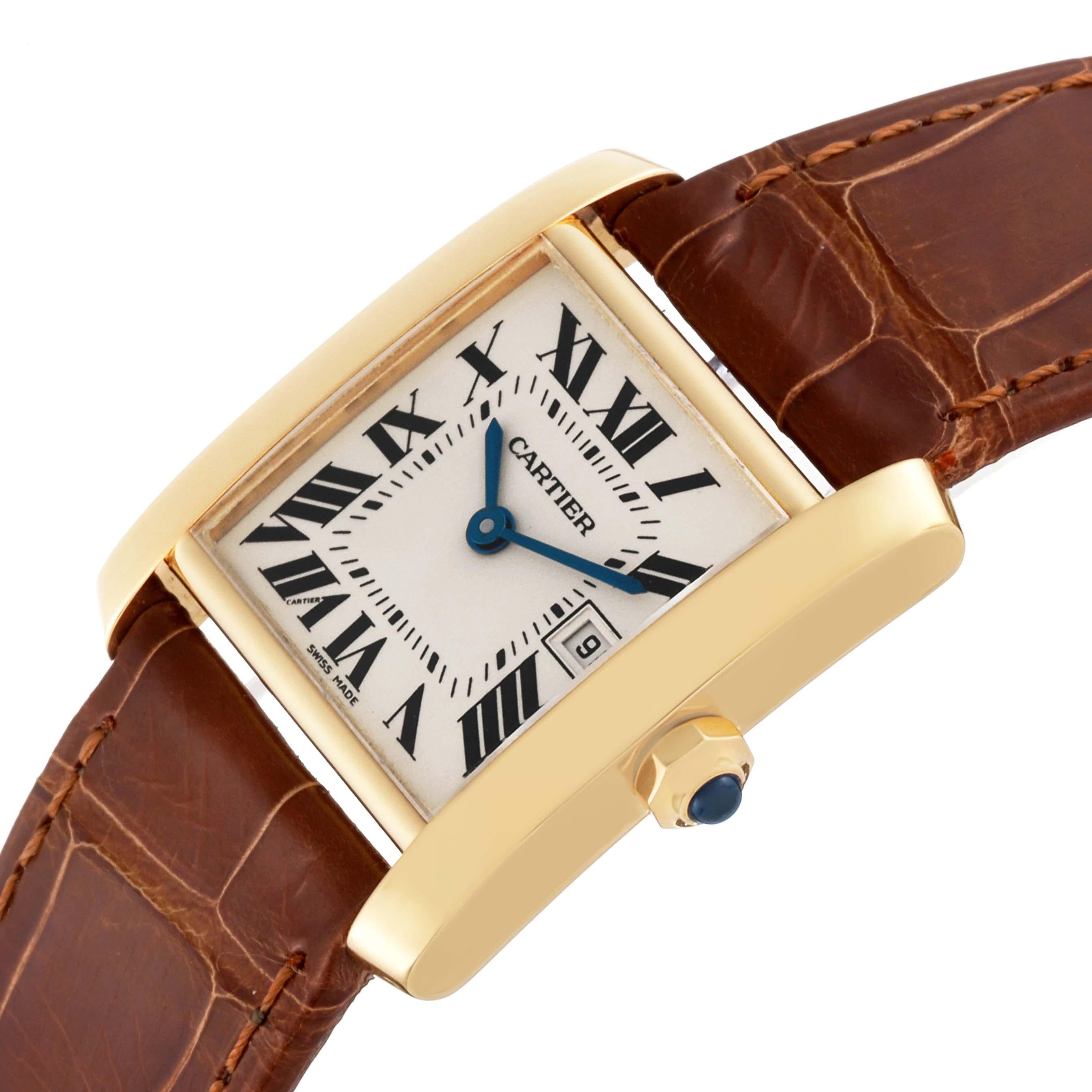 Cartier Tank Francaise Midsize Yellow Gold Ladies Watch W5001456. Quartz movement. 18K yellow gold 25 x 29 mm case. Octagonal crown set with a blue sapphire cabochon. . Scratch resistant sapphire crystal. Silver grained dial with black radial Roman