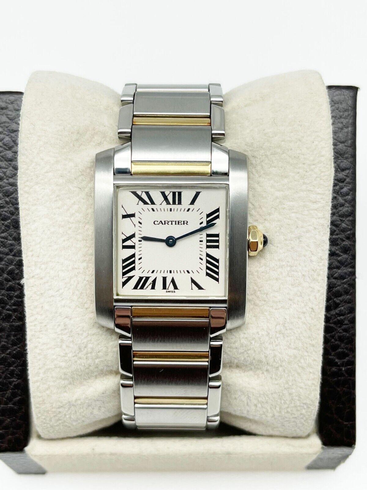 Style Number: 2301

 

Year: Estimated Early 2000's

 

Model: Tank Francaise 

 

Case Material: Stainless Steel

 

Band: 18K Yellow Gold & Stainless Steel 

 

Bezel: Stainless Steel 

 

Dial: Ivory

 

Face: Sapphire Crystal 

 

Case Size: