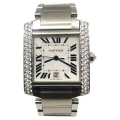 Cartier: Edelstahl-Uhr Tank Francaise Ref. 2302 mit Diamant-Lünette