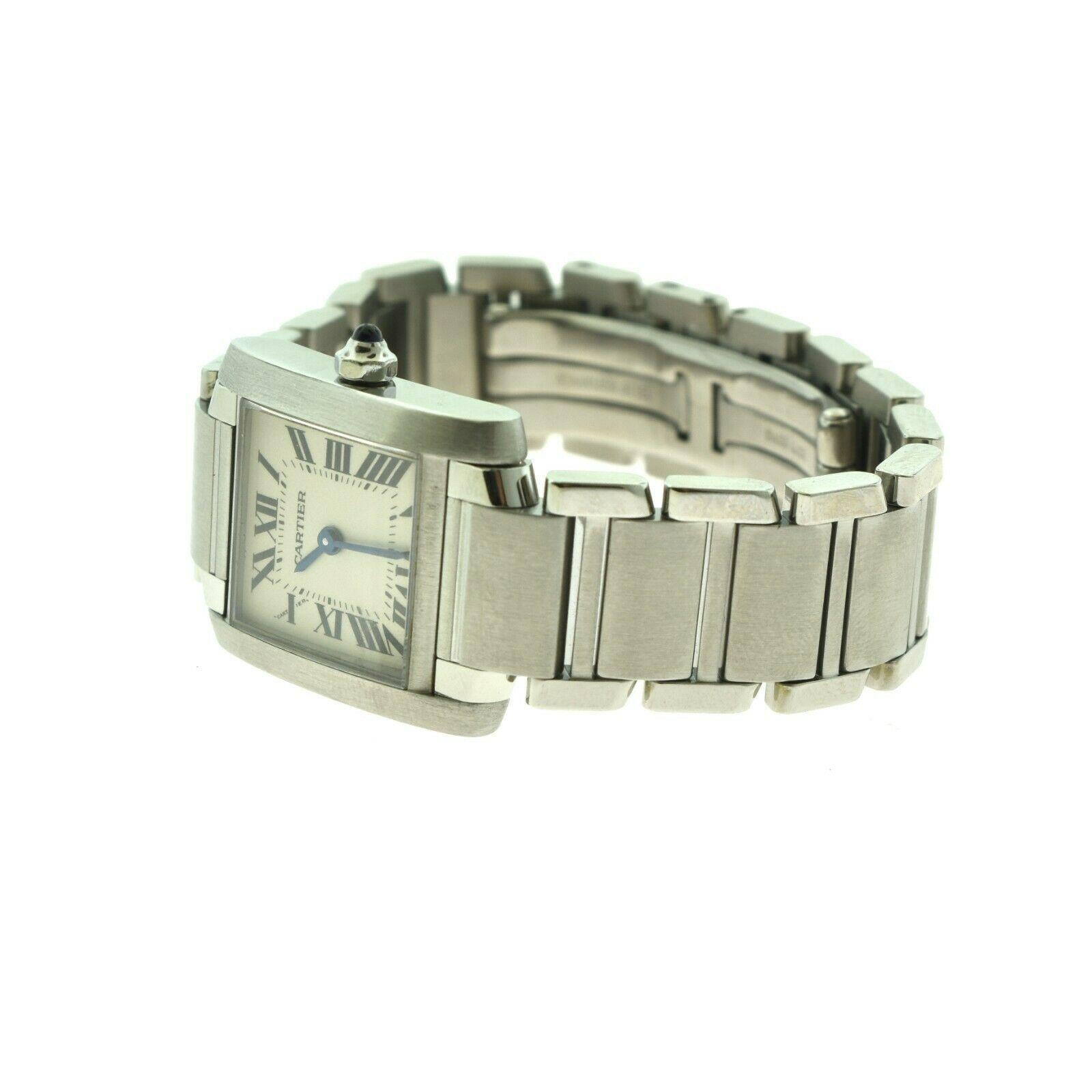 Designer: Cartier

Collection: Tank Francaise

Ref. Number: 2384 

​​​​​​​Movement: Quartz

Case Size: 25 mm x 20 mm

Case Material: Stainless Steel

Movement: Quartz

Hour Markers: Roman Numerals

Bracelet Material: Stainless Steel

Water