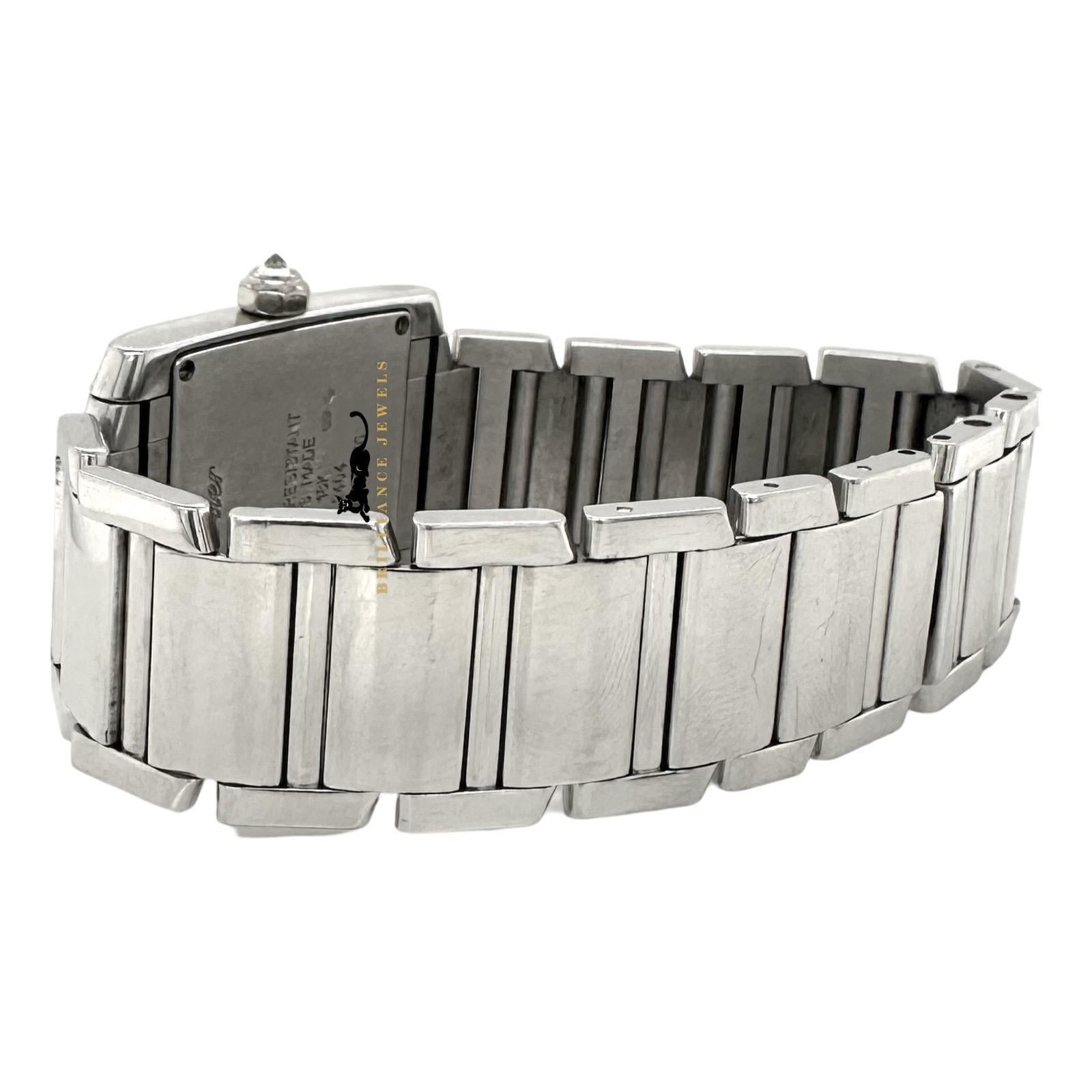 Brand: Cartier
Model Name: Tank Francaise 
Reference Number: 2404
Material: 18k White Gold
Case Size: 25 mm 
Case Material: 18k White Gold & Diamonds
Movement: Quartz (battery)
Dial Color: White
Dial: Roman Numerals
Bracelet: 18k White Gold
Box &