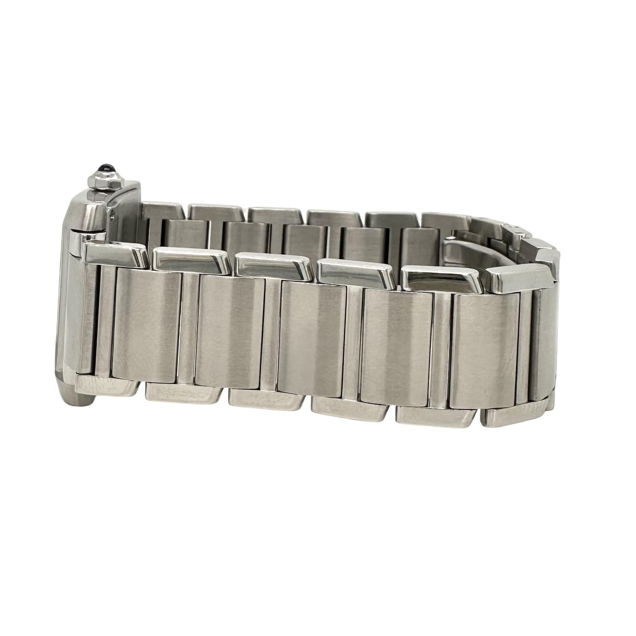Brand: Cartier
Model Name: Tank Francaise
Reference Number 2465
Movement: Quartz
Material: Stainless Steel
Dial: White with Black Roman Numeral Hour Markers
Case Size: 22 mm x 25 mm
Case Shape: Rectangle
Crystal: Sapphire
Features: Date
Bracelet: