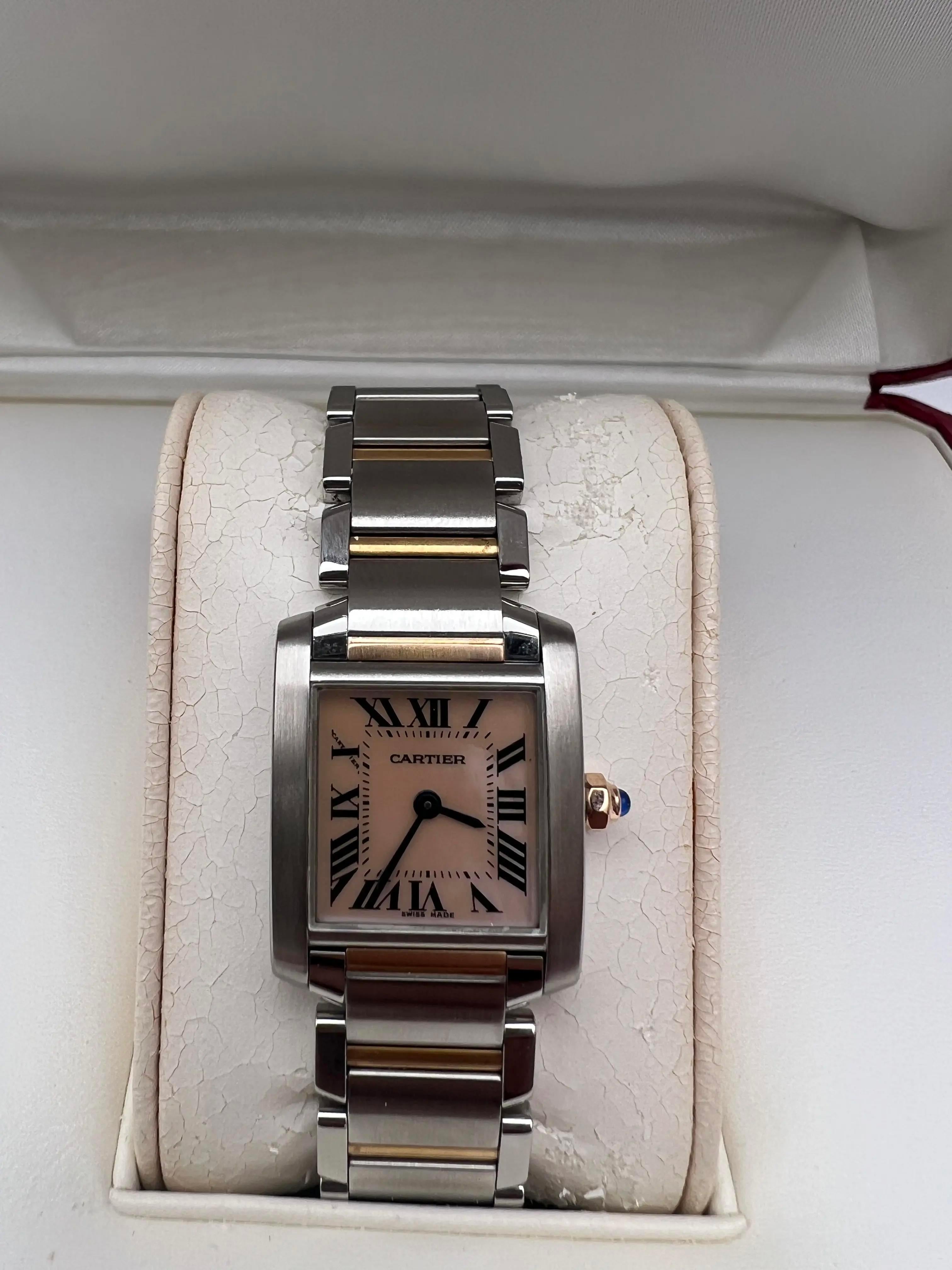 Cartier Tank Francaise Small W51027Q4, a beautifully crafted timepiece blending sophistication with everyday luxury. Featuring a two-tone 18K rose gold and stainless steel case measuring approximately 20mm x 25mm, this elegant watch showcases