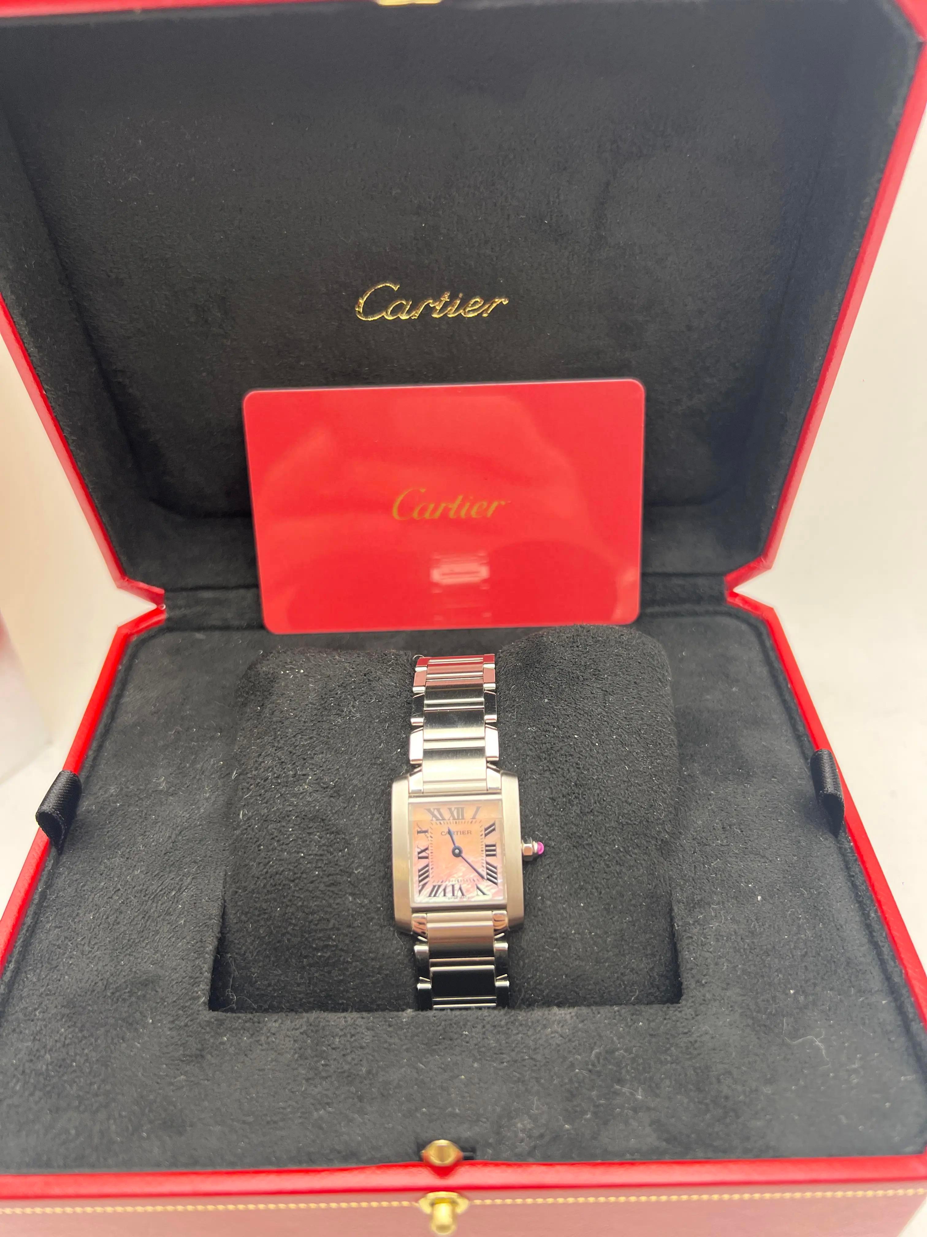 The Cartier Tank Française Small (ref. W51028Q3) is a beautifully elegant and timeless ladies’ watch. Crafted in polished stainless steel, the case measures approximately 20 × 25 mm, offering a slender and refined profile on the wrist. The smooth