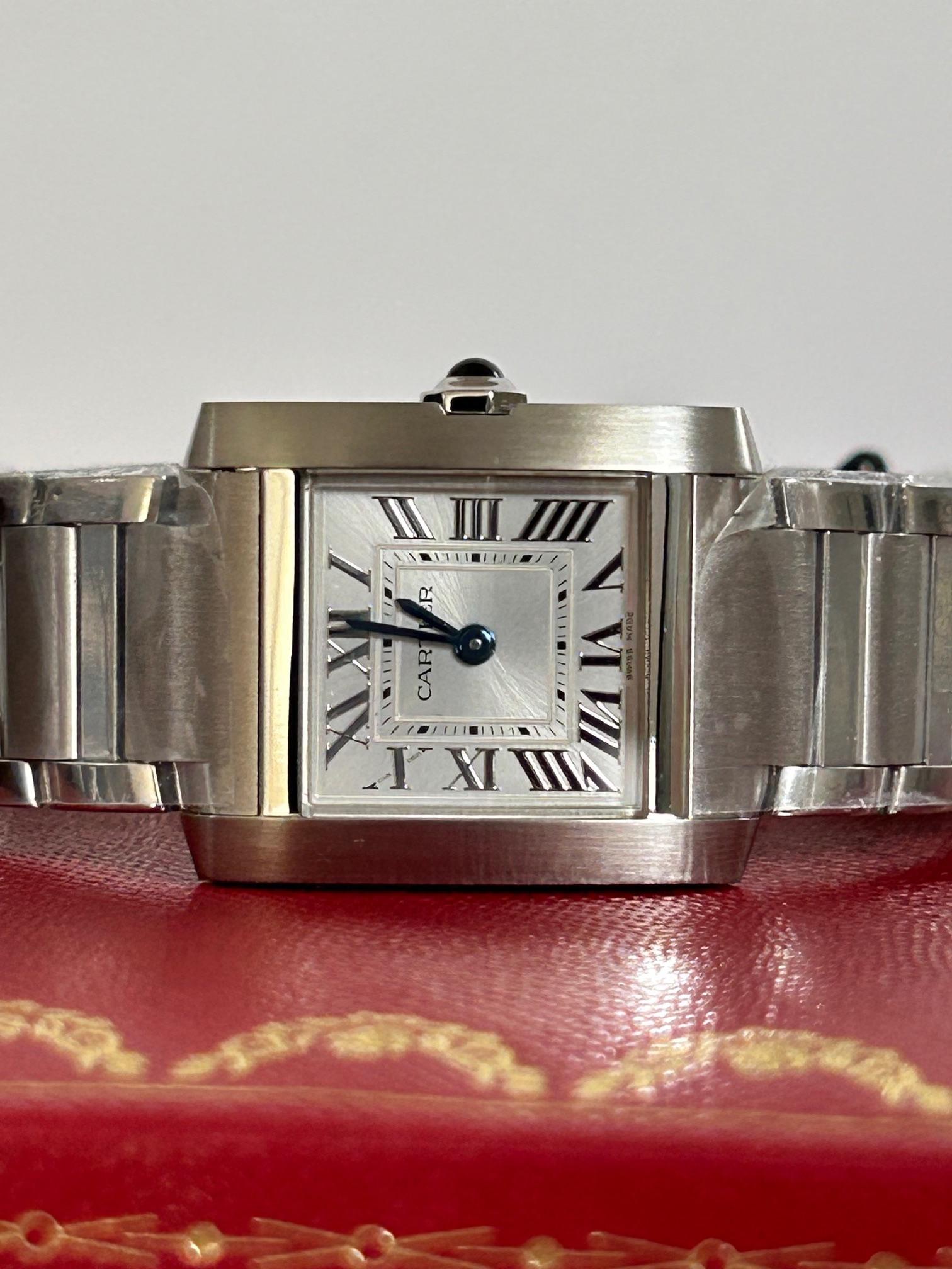 Our partially factory sealed ladies Cartier Tank Francaise Small size , reference WSTA0065 is the latest (and very sought after) version of the classic Tank Francaise, with silver sun ray dial. The stainless steel case measures 25.7mm x 21.2mm and