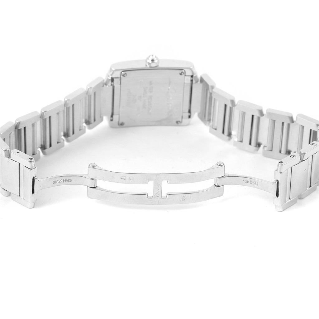Cartier Tank Francaise Small White Gold Diamond Ladies Watch WE1002S3. Quartz movement. Rectangular 18K white gold 20.0 x 25.0 mm case. Octagonal crown set with a diamond. 18k white gold diamond bezel. Scratch resistant sapphire crystal. Silvered