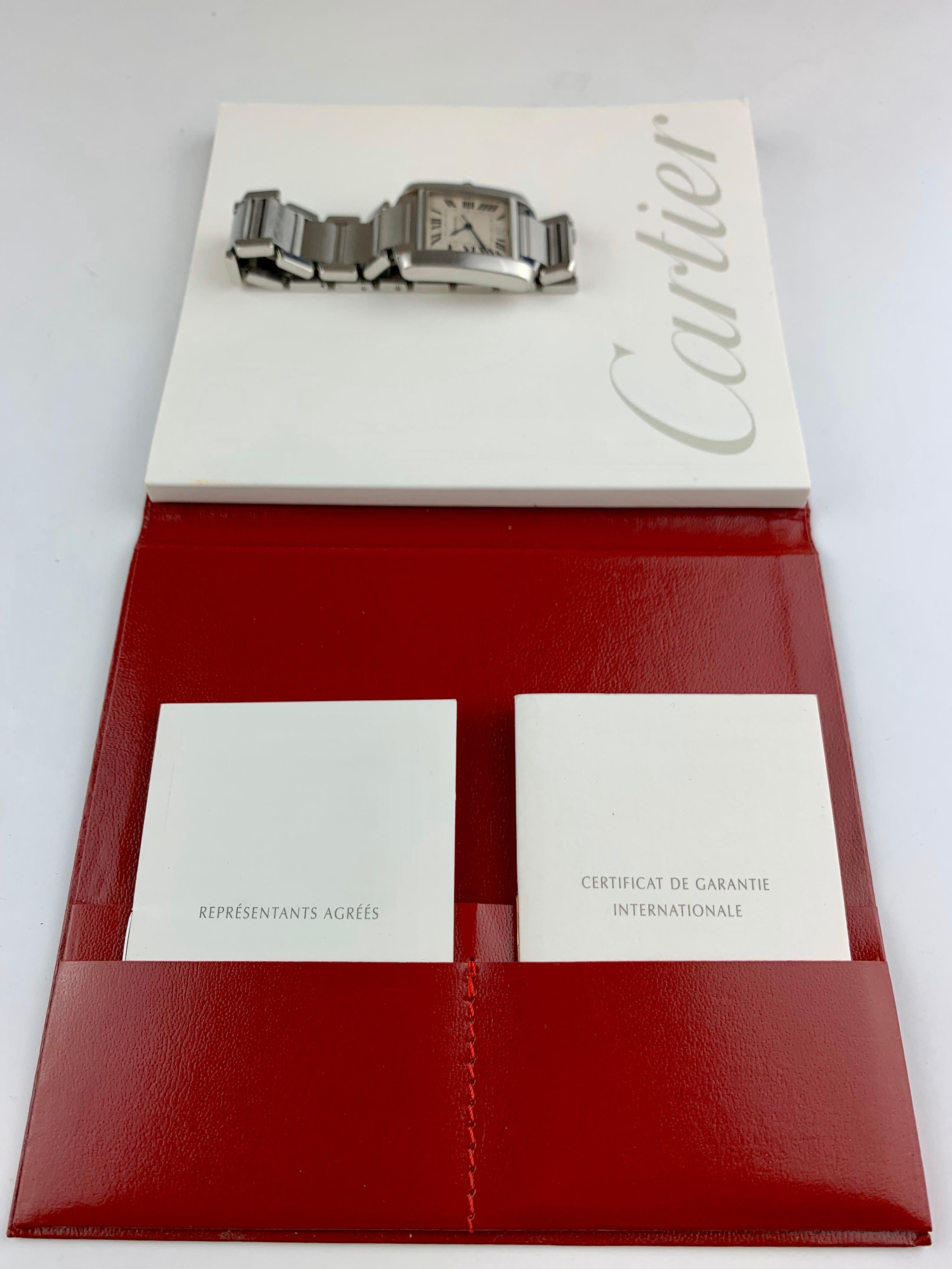 This is a pre-owned Cartier Tank Francaise Unisex Steel 2302 Swiss Made Automatic Watch. 
28mm by 32mm Case Size In Stainless Steel, Mother Of Pearl Roman Dial On A Stainless Steel Bracelet, Powered By A Quartz Movement. Water Resistant. This