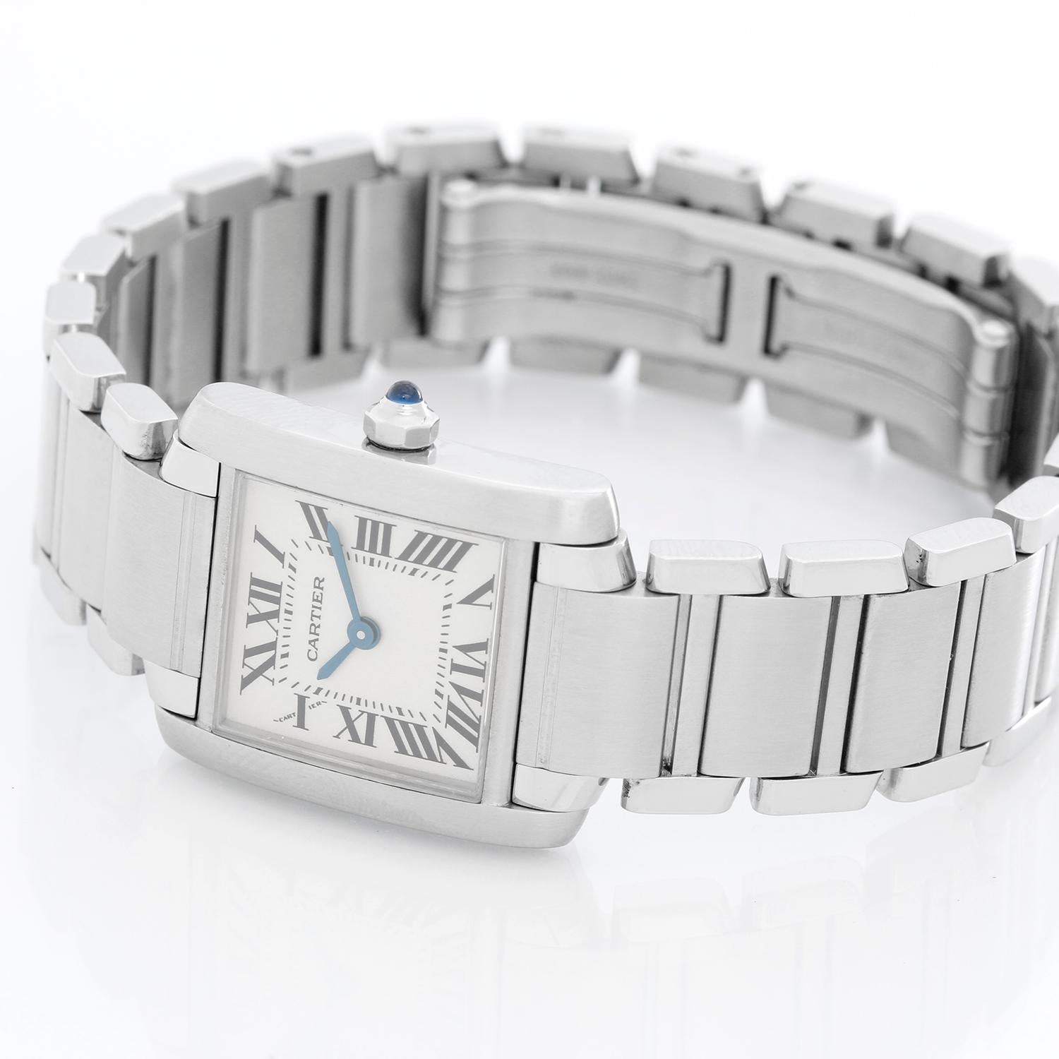 Cartier Tank Francaise Stainless  Steel Ladies Watch W51008Q3 - Quartz. Stainless Steel (20 x 25mm ). Ivory colored dial with black Roman numerals. Stainless Steel Cartier Tank Francaise bracelet with deployant clasp.. Pre-owned with custom box and