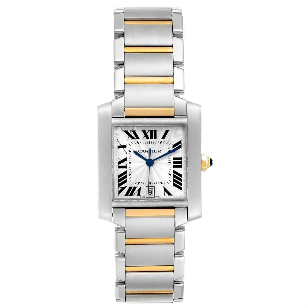 Cartier Tank Francaise Steel Yellow Gold Silver Dial Mens Watch W51005Q4. Automatic self-winding movement. Rectangular stainless steel 28.0 x 32.0 mm case. Octagonal 18K yellow gold crown set with a blue spinel cabochon. Stainless steel bezel.
