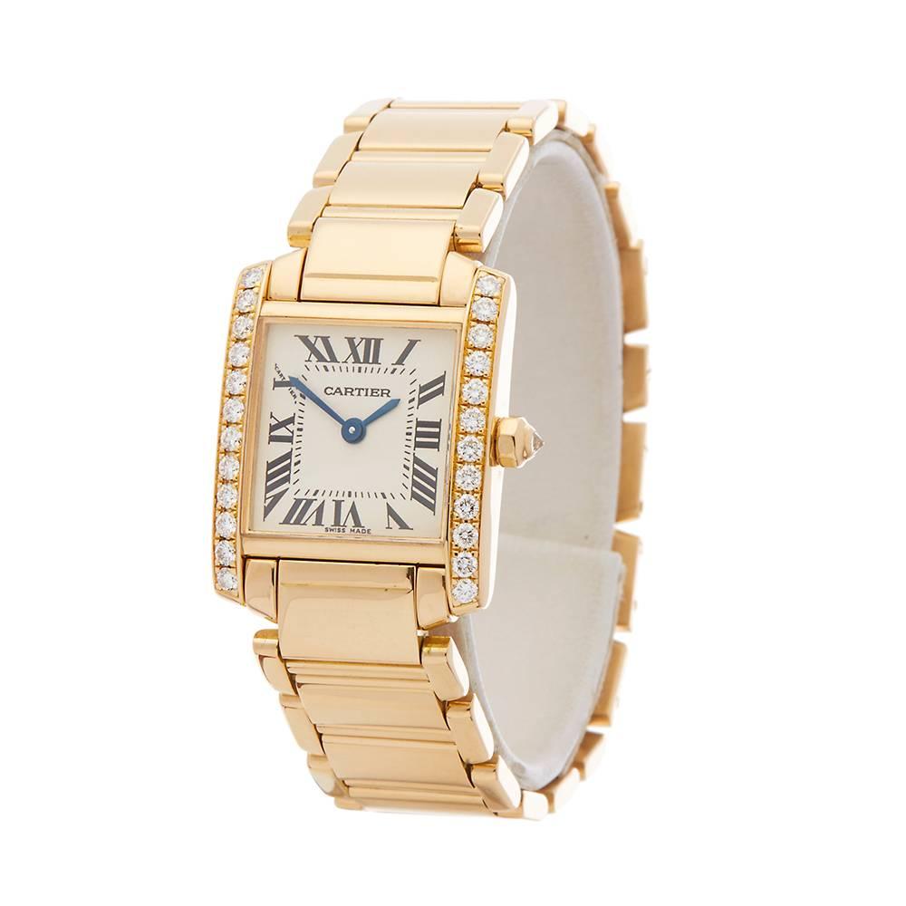 Ref: COM1298
Manufacturer: Cartier
Model: Tank Francaise
Model Ref: 2385 or WE1001R8
Age: 16th April 2002
Gender: Ladies
Complete With: Box Manuals & Guarantee
Dial: White Roman 
Glass: Sapphire Crystal
Movement: Quartz
Water Resistance: To
