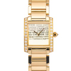 Montre femme Cartier Tank Française WE1023R8, or jaune 18 carats, mouvement automatique, cadran doré, 21 mm