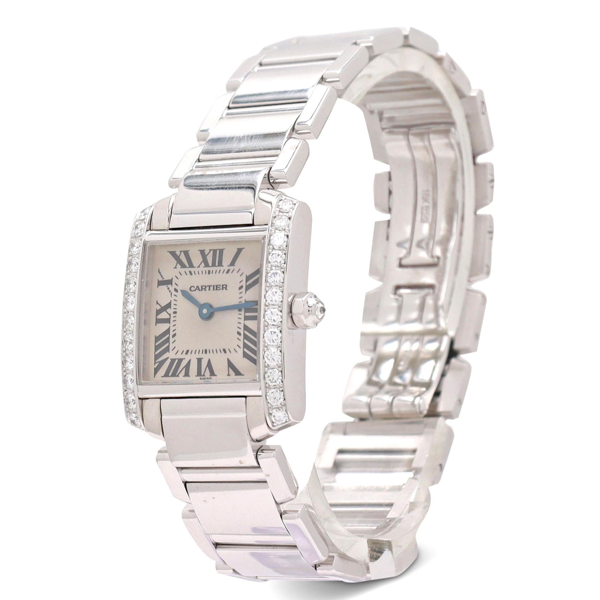 Authentic Cartier 'Tank Française' watch crafted in 18 karat white gold. The rectangular case (20 mm x 25 mm) is set with high-quality round brilliant cut diamonds and the octagonal crown is set with one diamond. Silvered dial with painted black