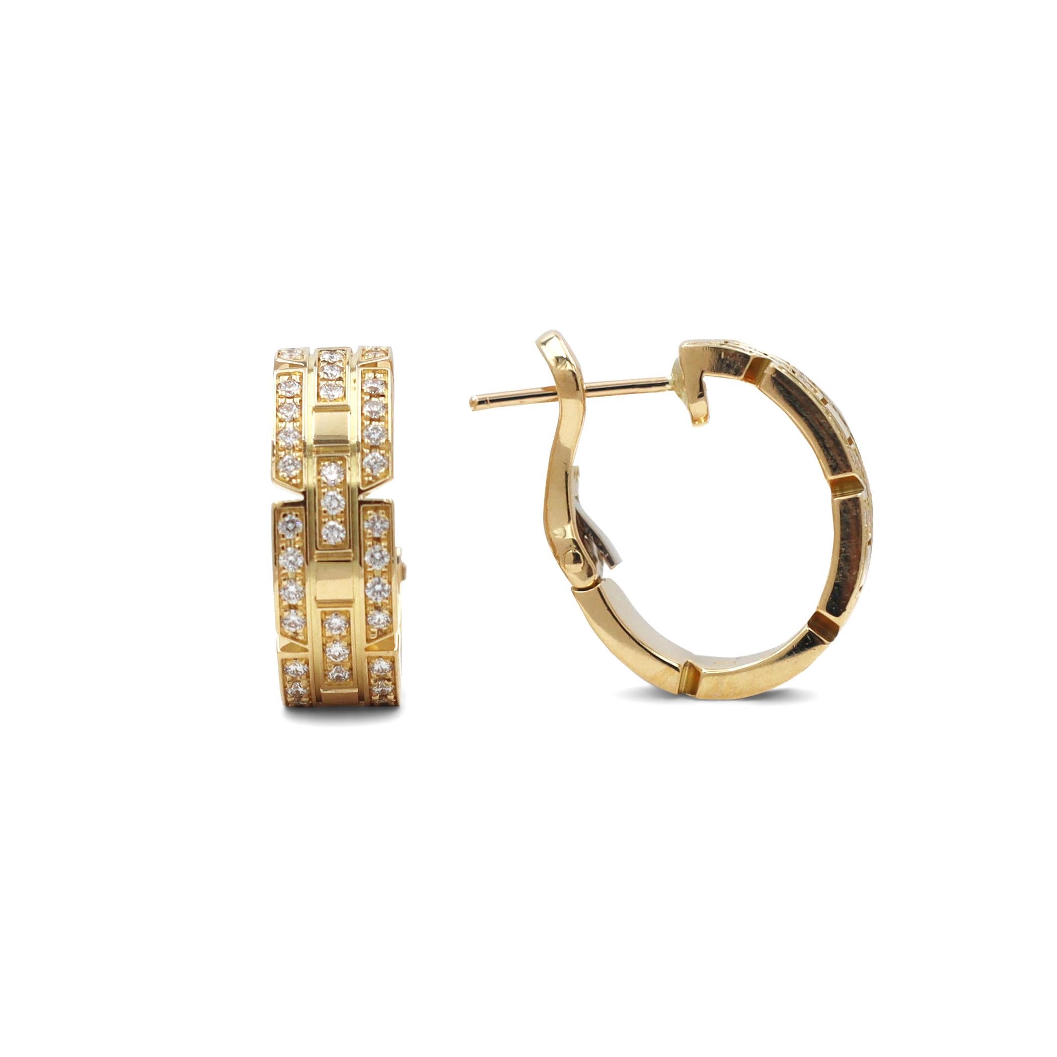 Authentic Cartier 'Tank Française' earrings crafted in 18 karat yellow are composed of three rows of iconic flat links in a half hoop design. The earrings are set with an estimated 0.78 carats of high-quality round brilliant cut diamonds (E-F, VS).