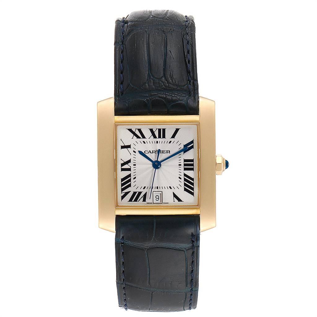 Cartier Tank Francaise Yellow Gold Black Strap Mens Watch W5000156. Automatic self-winding movement. Rectangular 28.0 x 32.0 mm case. Octagonal 18K yellow gold crown set with a blue sapphire cabochon. Scratch resistant sapphire crystal. Silver