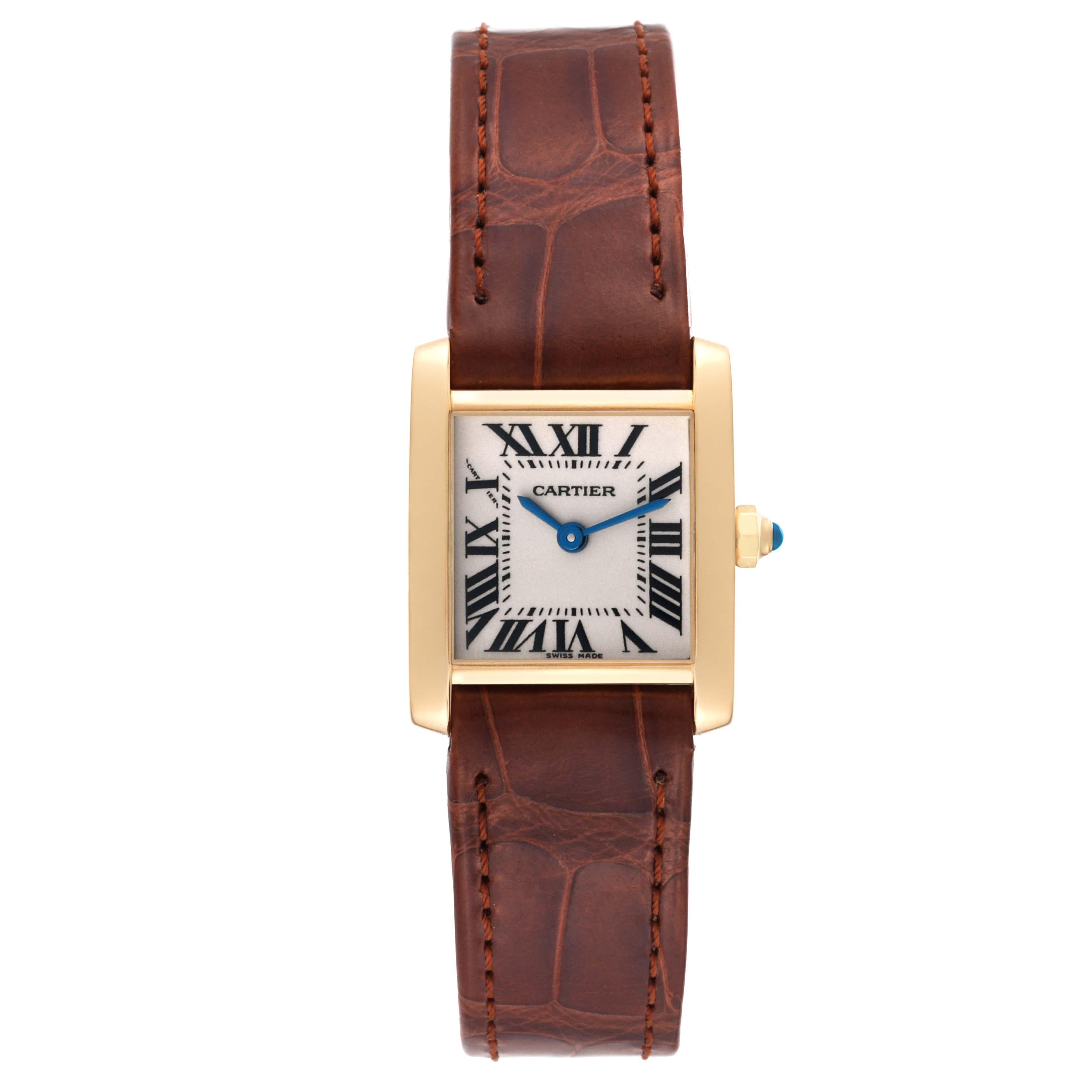 Cartier Tank Francaise Yellow Gold Brown Strap Ladies Watch W5000256. Quartz movement. 18K yellow gold rectangular case 20.0 x 25.0 mm case. Octagonal crown set with a blue sapphire cabochon. . Scratch resistant sapphire crystal. Silver dial with