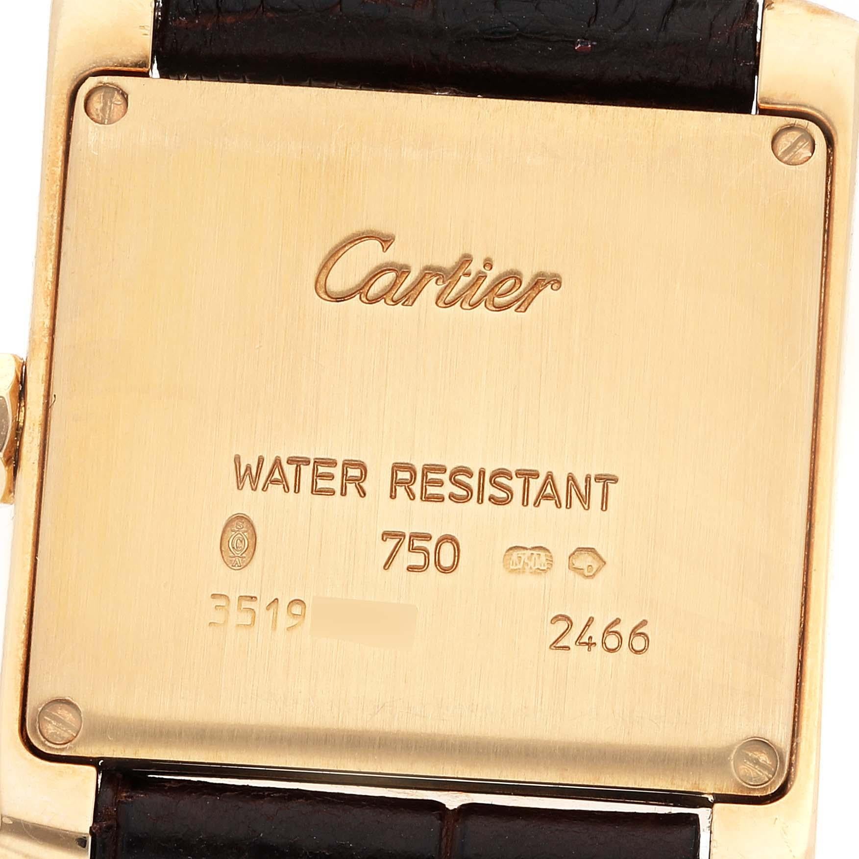 Cartier Tank Francaise Yellow Gold Ladies Watch W5001456. Quartz movement. 18K yellow gold 25 x 29 mm case. Octagonal crown set with a blue sapphire cabochon. . Scratch resistant sapphire crystal. Silver grained dial with black radial Roman