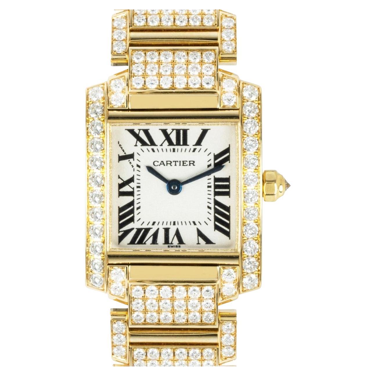 A stunning ladies 20mm Cartier Tank Francaise crafted in yellow gold. Features a silver dial with applied roman numerals, blued-steel sword-shaped hands and a secret Cartier signature at X. Complementing the dial is a yellow gold bezel set with