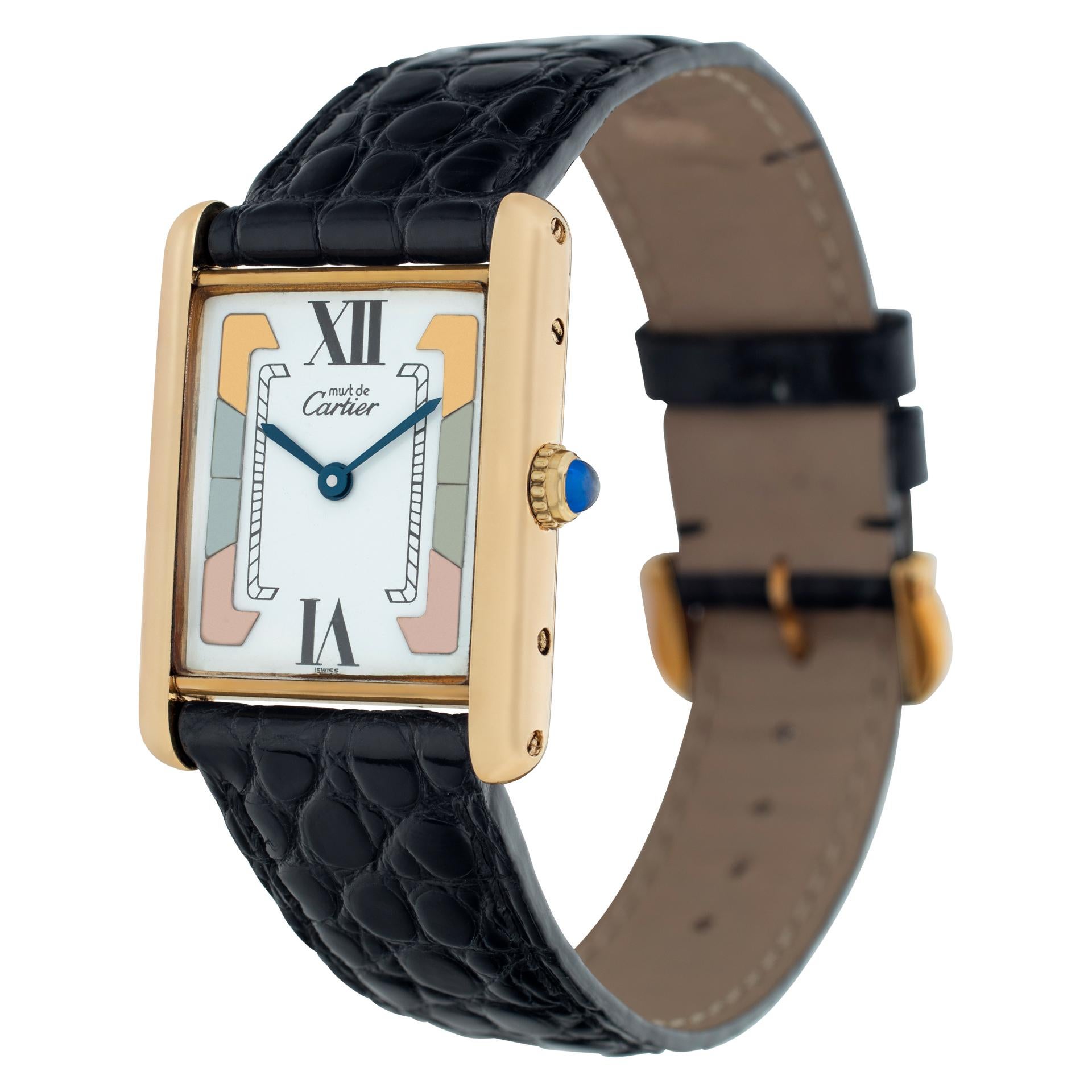 Cartier Tank Louis in 18k yellow gold on a black crocodile strap with 18k tang buckle. White dial with tri-color gold elements. Quartz. 23 mm x 30 mm case size. Circa 2000. Fine Pre-owned Cartier Watch. Certified preowned Classic Cartier Tank watch