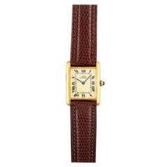 Montre Cartier Tank cadran citron en or jaune 18 carats