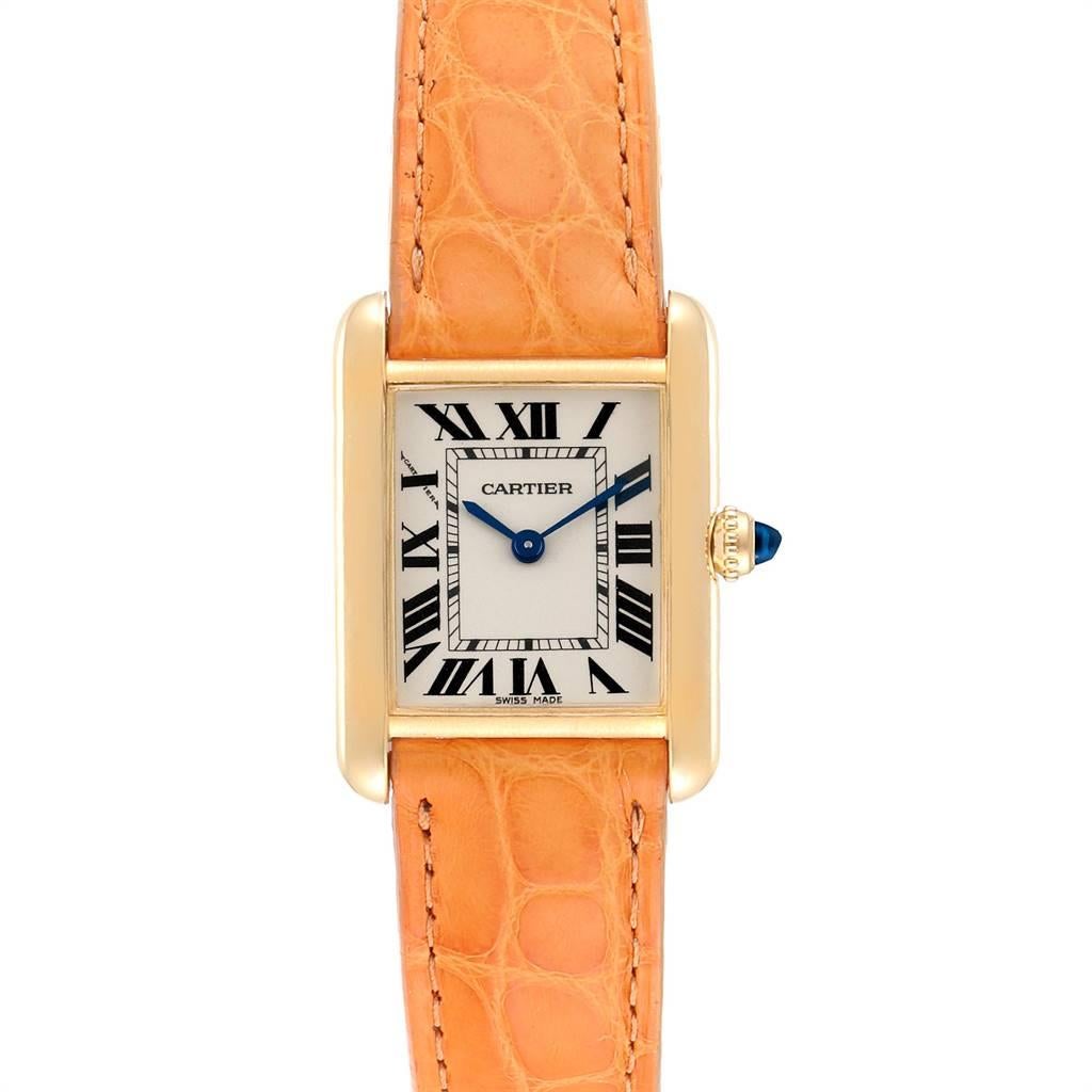 Cartier Tank Louis 18k Yellow Gold Brown Strap Ladies Watch W1529856. Quartz movement. 18k yellow gold case 29.0 x 22.0 mm. Circular grained crown set with the blue sapphire cabochon. 18K yellow gold bezel. Scratch resistant sapphire crystal.