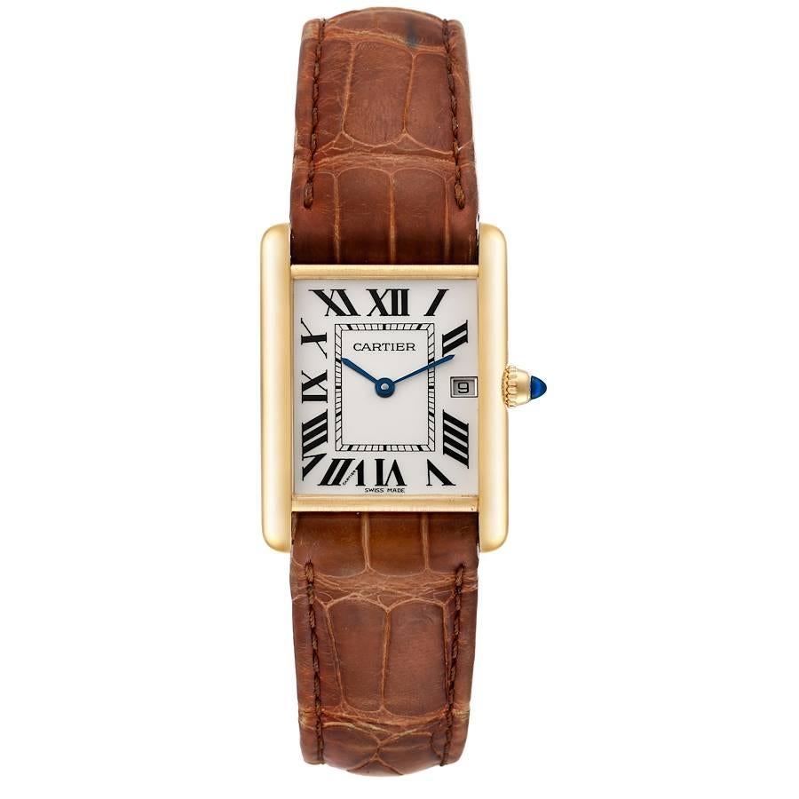 Cartier Tank Louis 18K Yellow Gold Brown Strap Mens Watch W1529756 Card. Quartz movement. 18k yellow gold case 25.0 x 33.0 mm. Circular grained crown set with a blue sapphire cabochon. . Scratch resistant sapphire crystal. Silvered opaline dial.