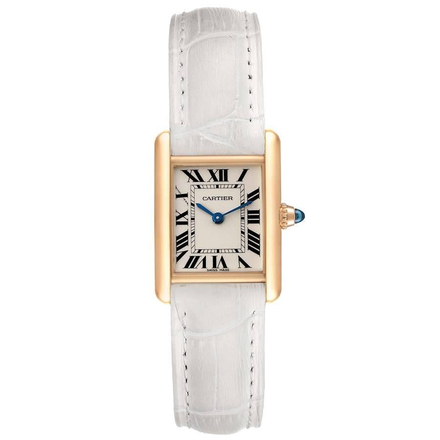 Cartier Tank Louis 18k Yellow Gold White Strap Ladies Watch W1529856. Quartz movement. 18k yellow gold case 29.0 x 22.0 mm. Circular grained crown set with the blue sapphire cabochon. . Scratch resistant sapphire crystal. Silvered grained dial.