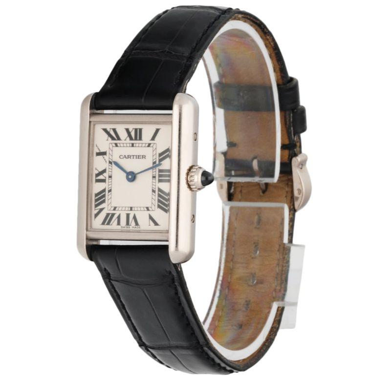 Cartier Tank Louis 2679  Men's Watch. 22mm 18K white gold case. Off-White dial with Blue steel hands and Roman numeral hour markers. Minute markers on the inner dial. Black leather strap with 18K white gold buckle. Will fit up to a 7-Inch wrist.