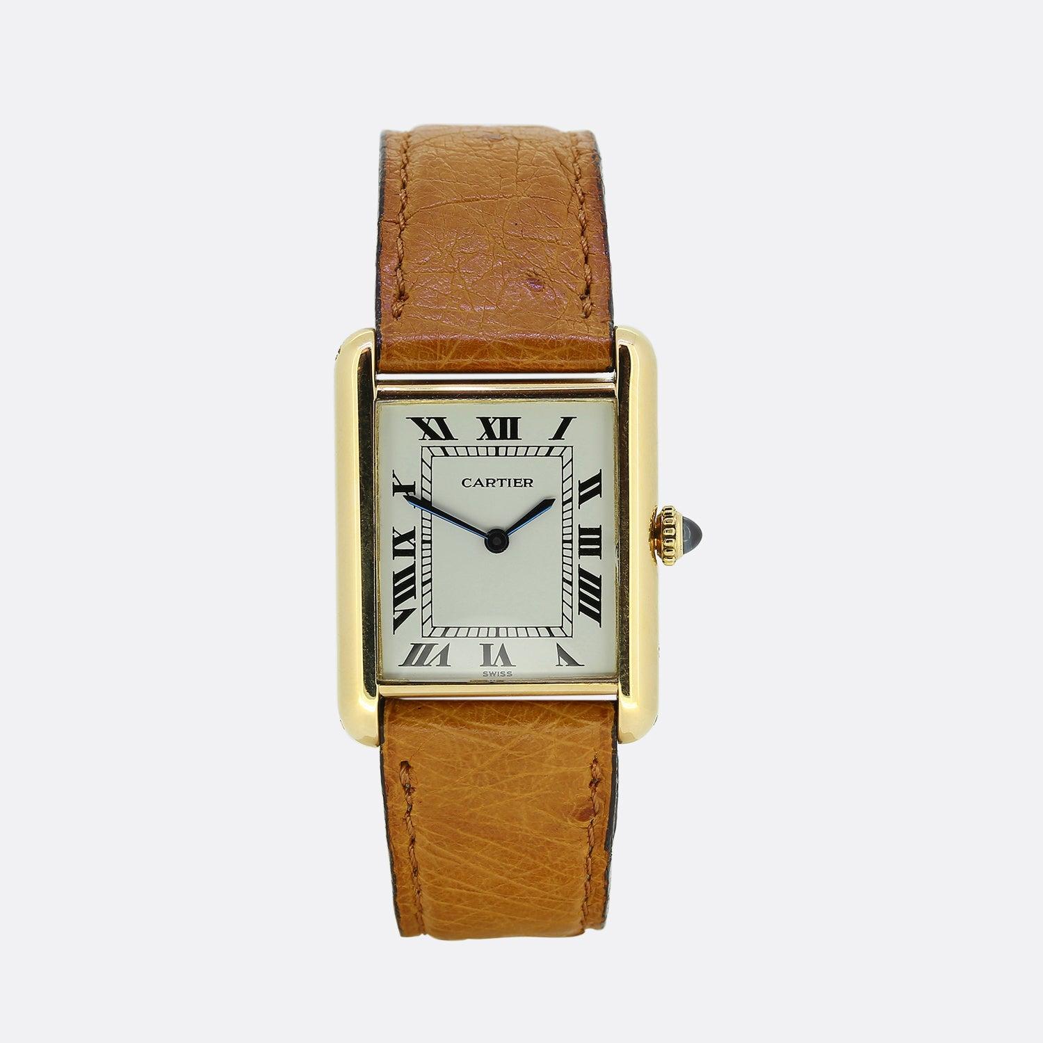 Here we have a classic and quintessential timepiece from the world renowned jewellery house of Cartier. The Cartier Tank has been an icon for over 100 years with its rectangular shaped case; in this respect crafted from 18ct yellow gold. The plain