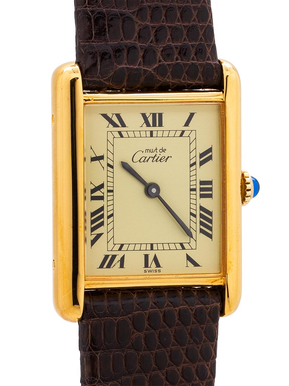 
Cartier Man’s Tank Louis circa 1990s. Featuring 24 x 30mm vermeil (20 microns gold over silver) case secured by 4 side screws. Featuring classic cream color dial signed Must de Cartier with printed black Roman numerals and blued steel hands.