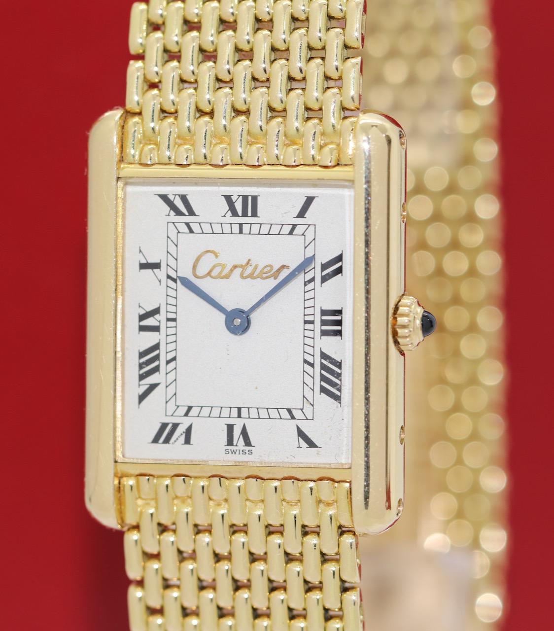 Beautiful and timeless Cartier Tank ladies' watch. Case, strap and clasp made of 18k solid gold.

Very good original condition. From first owner.
With full number of links and Original Cartier Papers.
First purchase in 1990 from Cartier Boutique,