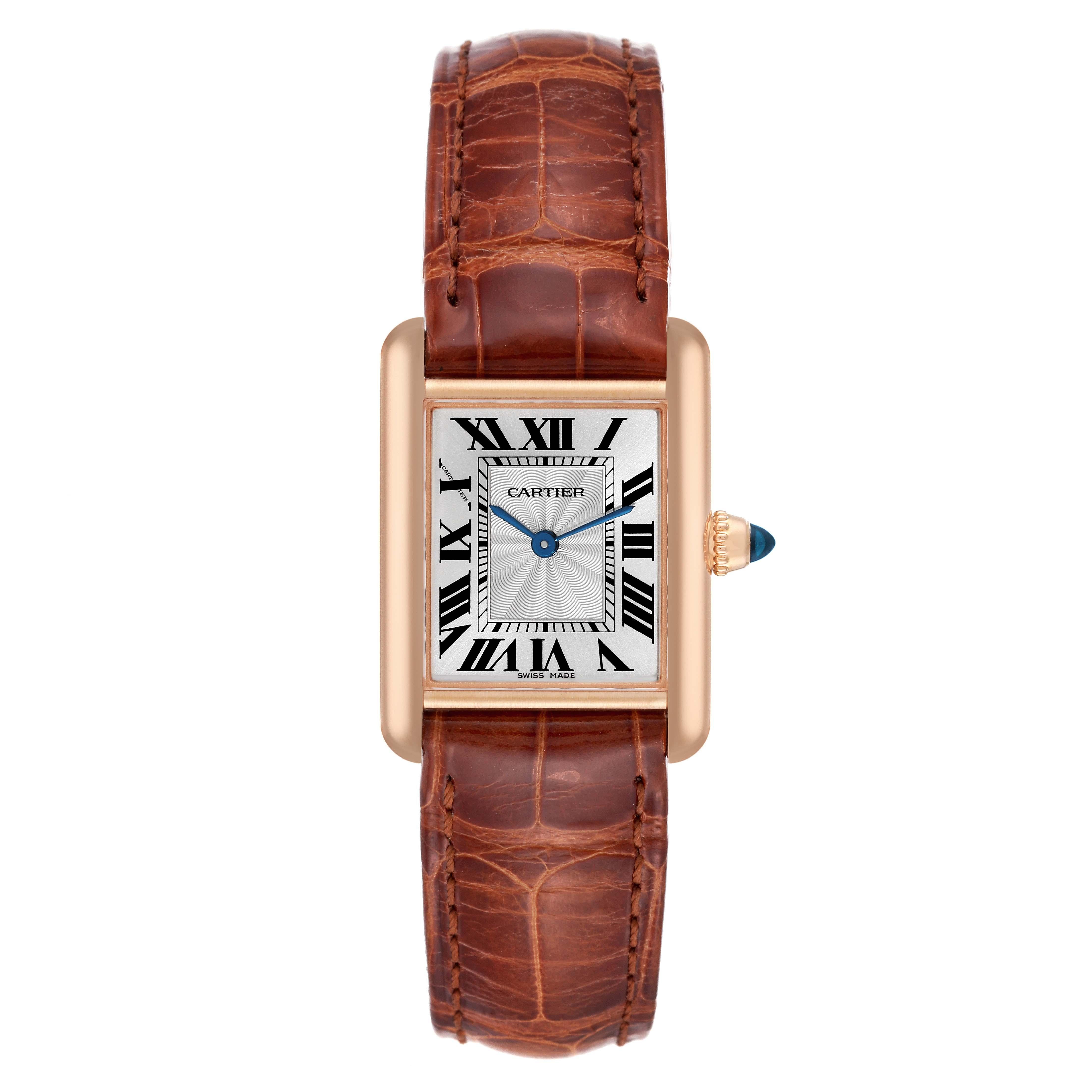 Cartier Tank Louis Rose Gold Mechanical Ladies Watch WGTA0010 Box Card. Manual winding movement. 18k rose gold case 29.5 x 22.0 mm. Circular grained crown set with the blue sapphire cabochon. . Scratch resistant sapphire crystal. Silvered guilloche