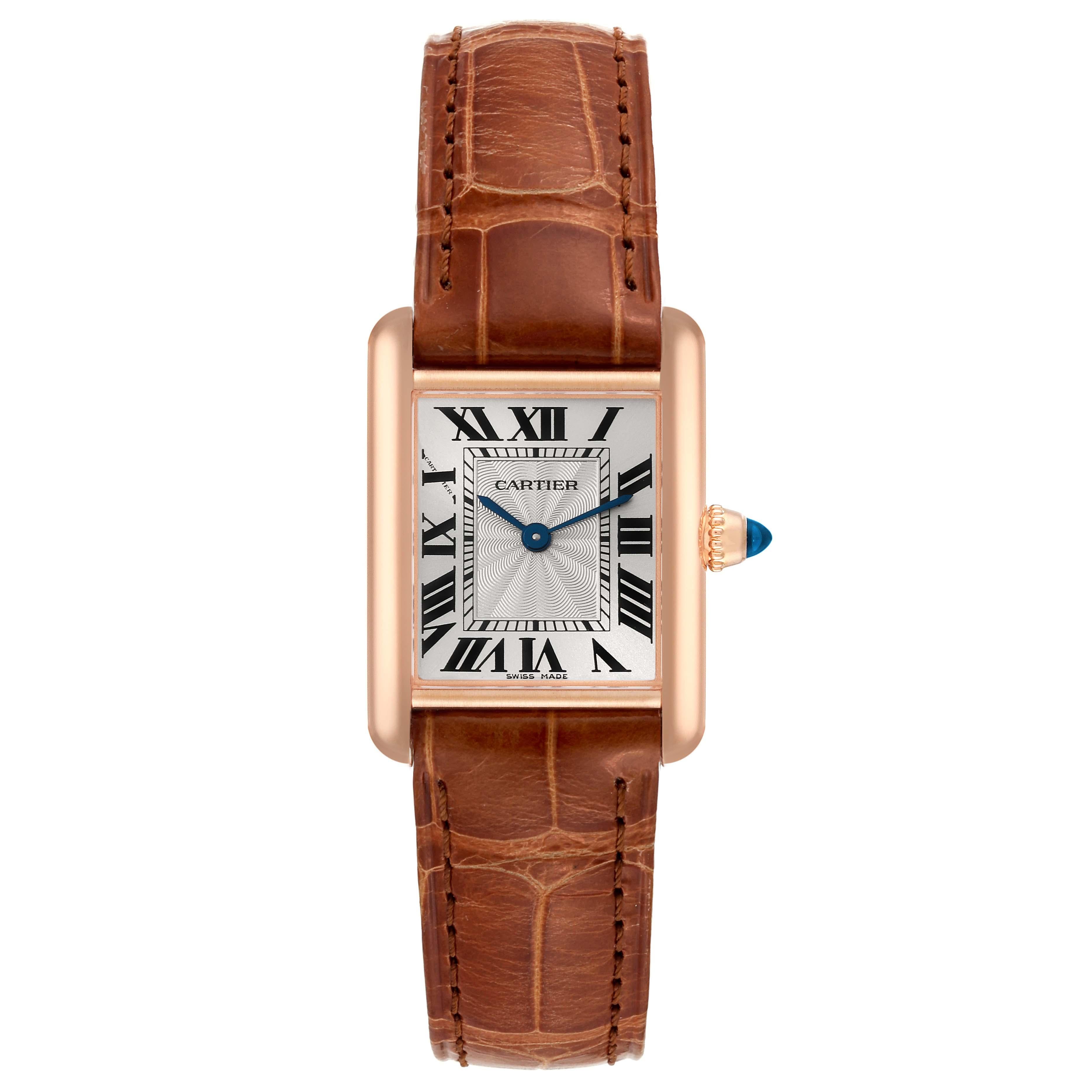Cartier Tank Louis Rose Gold Mechanical Ladies Watch WGTA0010 Box Card. Manual winding movement. 18k rose gold case 29.5 x 22.0 mm. Circular grained crown set with a blue sapphire cabochon. . Mineral crystal. Silvered guilloche dial with black Roman