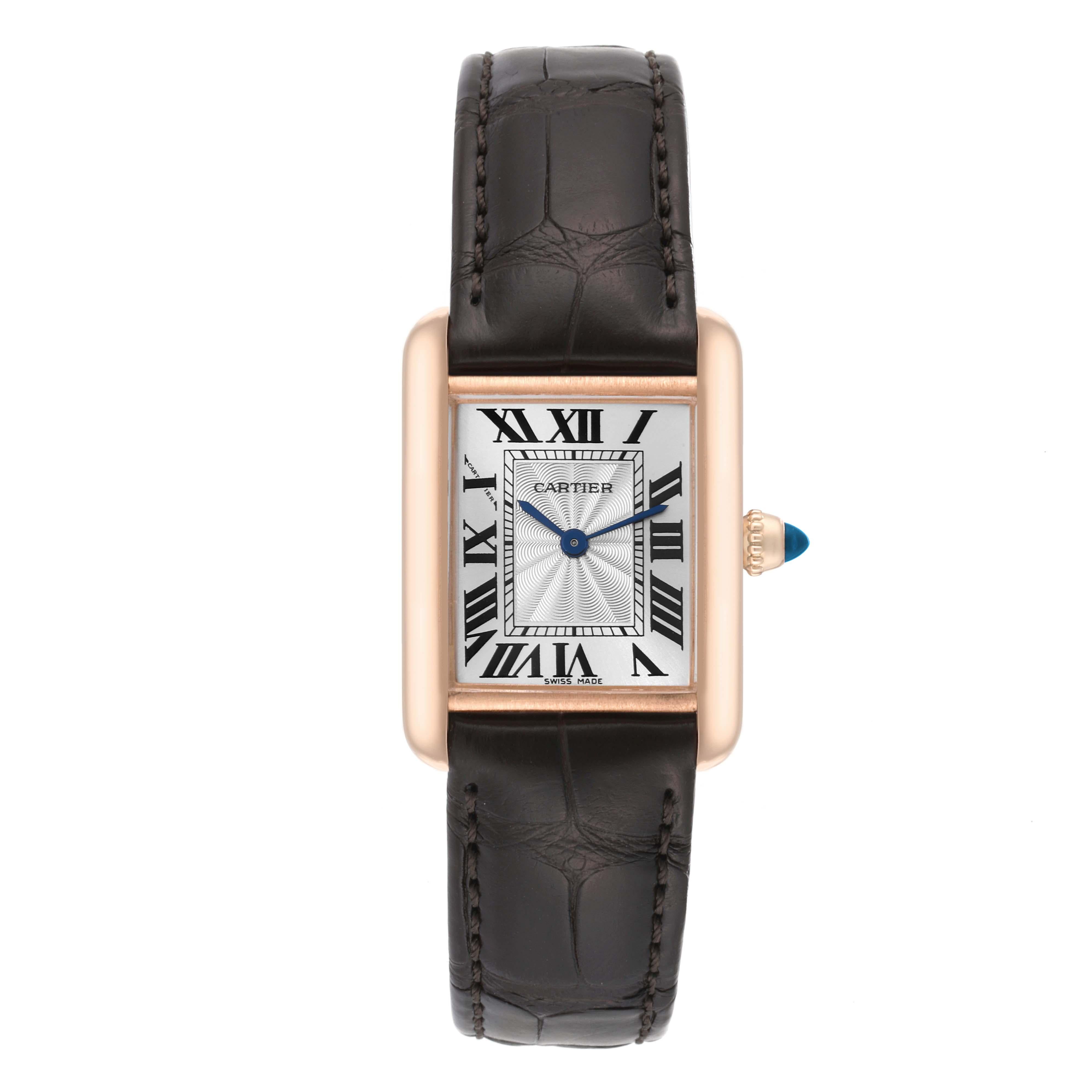 Cartier Tank Louis Rose Gold Mechanical Ladies Watch WGTA0010 Card. Manual winding movement. 18k rose gold case 29.5 x 22.0 mm. Circular grained crown set with a blue sapphire cabochon. . Scratch resistant sapphire crystal. Silvered guilloche dial