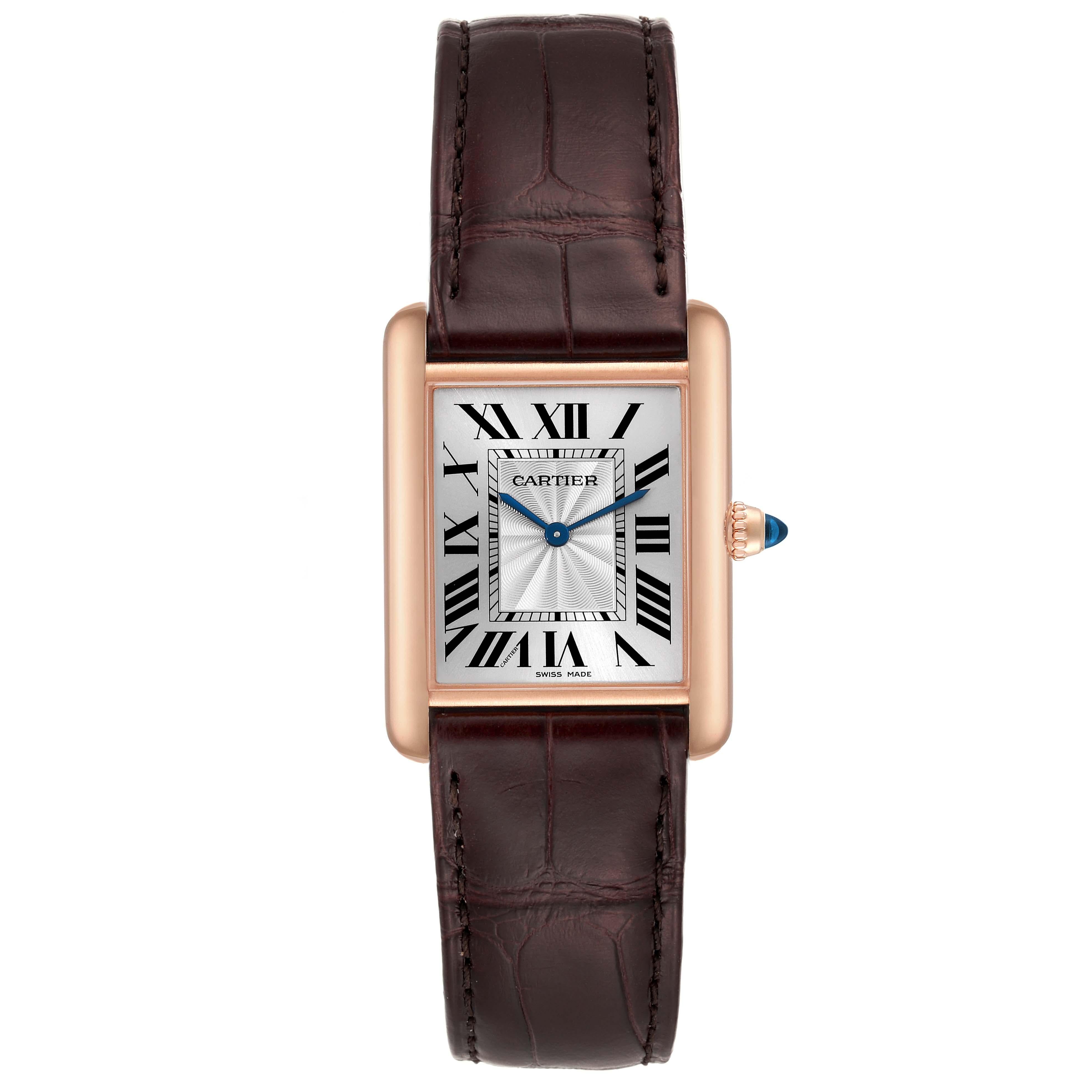 Cartier Tank Louis Rose Gold Mechanical Mens Watch WGTA0011 Box Card. Manual winding movement. 18k rose gold case 25 mm x 33 mm. Circular grained crown set with a blue sapphire cabochon. . Mineral crystal. Silvered guilloche dial with black Roman