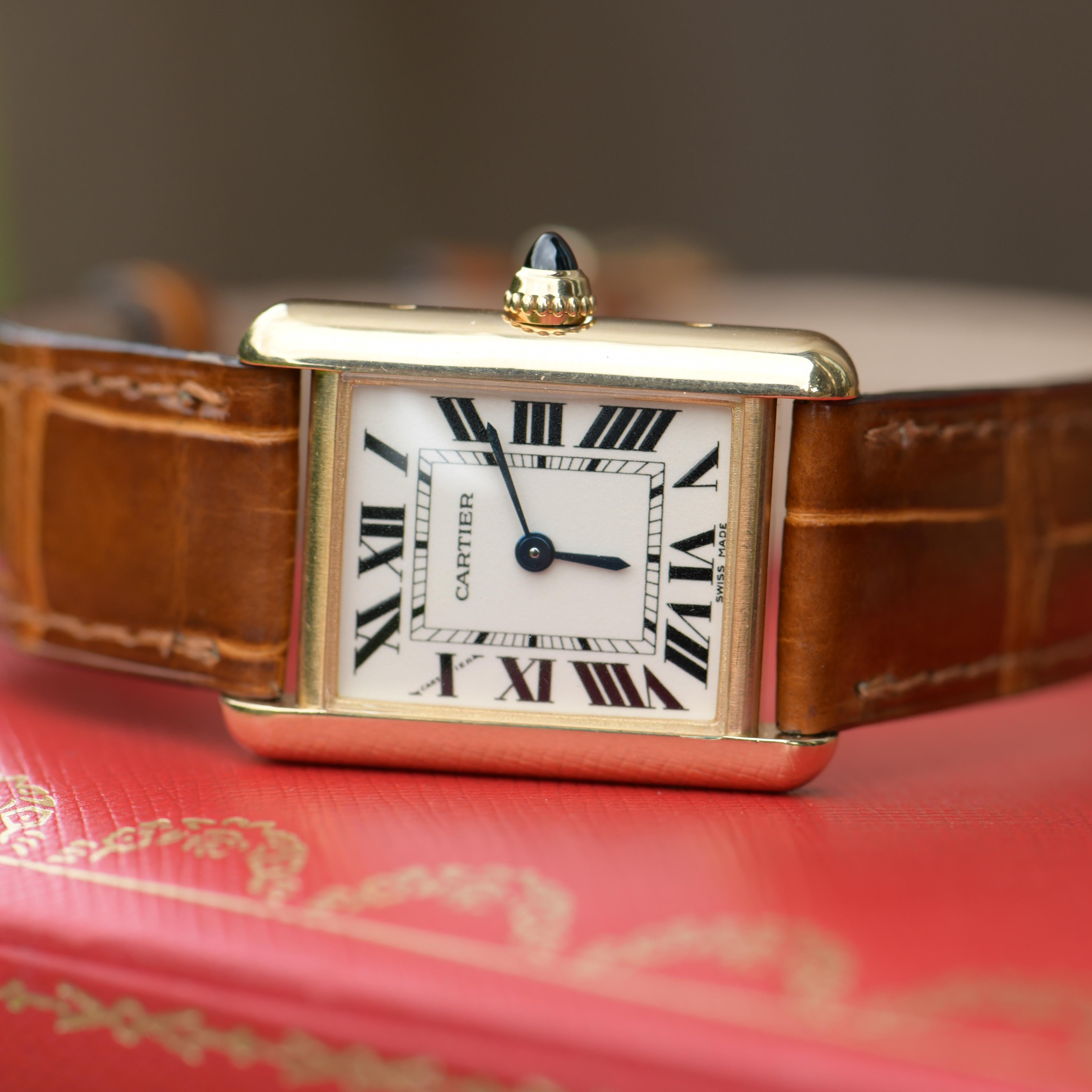 romano watch 18k gold