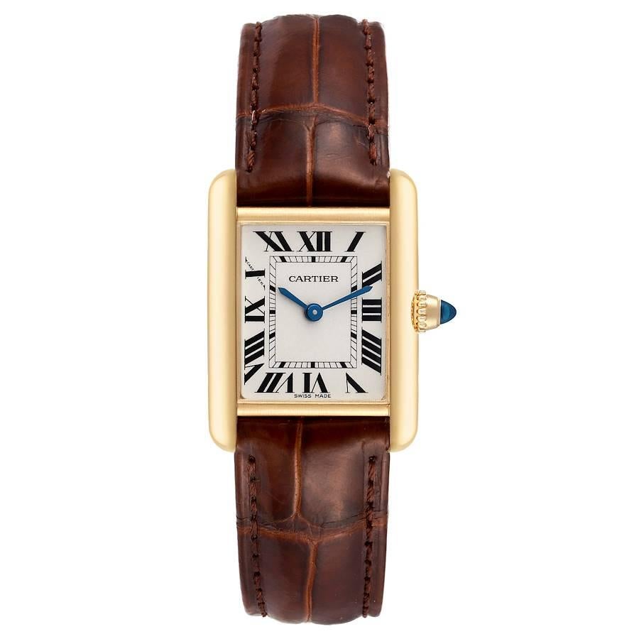 Cartier Tank Louis Small Yellow Gold Brown Strap Ladies Watch W1529856 Card. Quartz movement. 18k yellow gold case 29.0 x 22.0 mm. Circular grained crown set with a blue sapphire cabochon. . Scratch resistant sapphire crystal. Silvered grained dial