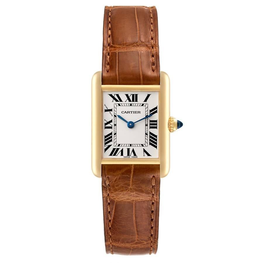 Cartier Tank Louis Small Yellow Gold Brown Strap Ladies Watch W1529856. Quartz movement. 18k yellow gold case 29.0 x 22.0 mm. Circular grained crown set with a blue sapphire cabochon. . Scratch resistant sapphire crystal. Silvered grained dial with