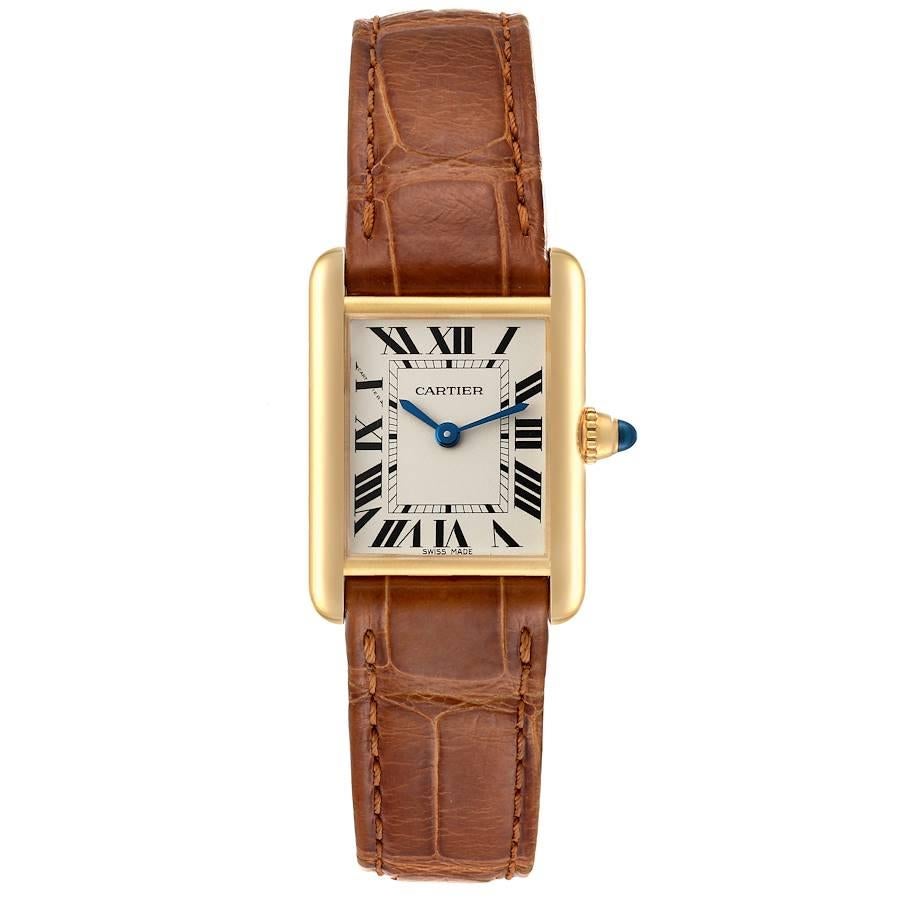 Cartier Tank Louis Small Yellow Gold Brown Strap Ladies Watch W1529856. Quartz movement. 18k yellow gold case 29.0 x 22.0 mm. Circular grained crown set with a blue sapphire cabochon. . Scratch resistant sapphire crystal. Silvered grained dial with