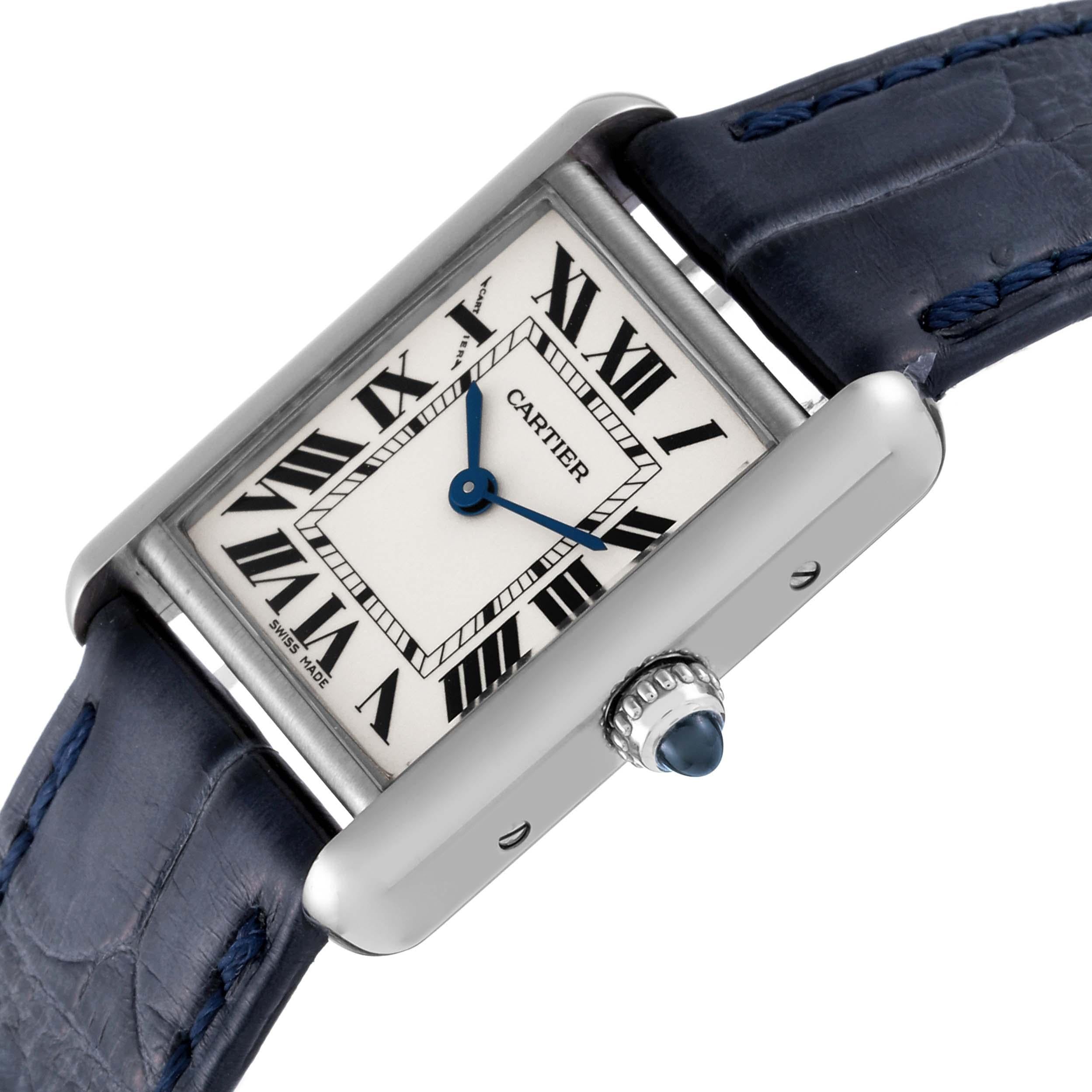 Cartier Tank Louis White Gold Blue Strap Ladies Watch W1541056. Quartz movement. 18K white gold case 22 mm x 29 mm. Circular grained crown set with a blue sapphire cabochon. . Scratch resistant mineral crystal. Silver grained dial with black Roman