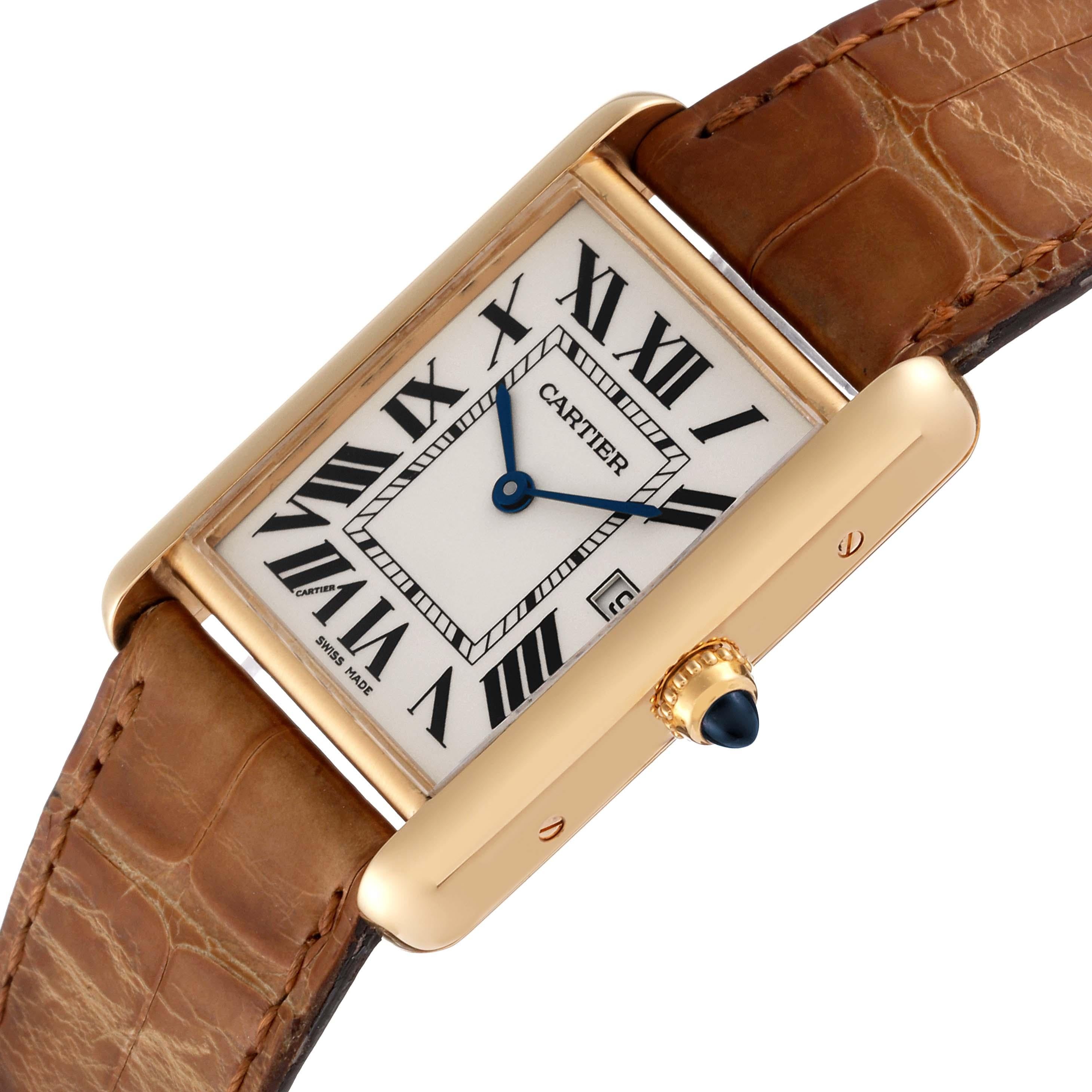 Cartier Tank Louis Yellow Gold Brown Leather Strap Mens Watch W1529756 Card. Quartz movement. 18k yellow gold case 25.0 x 33.0 mm. Circular grained crown set with a blue sapphire cabochon. . Mineral crystal. Silvered opaline dial with black Roman